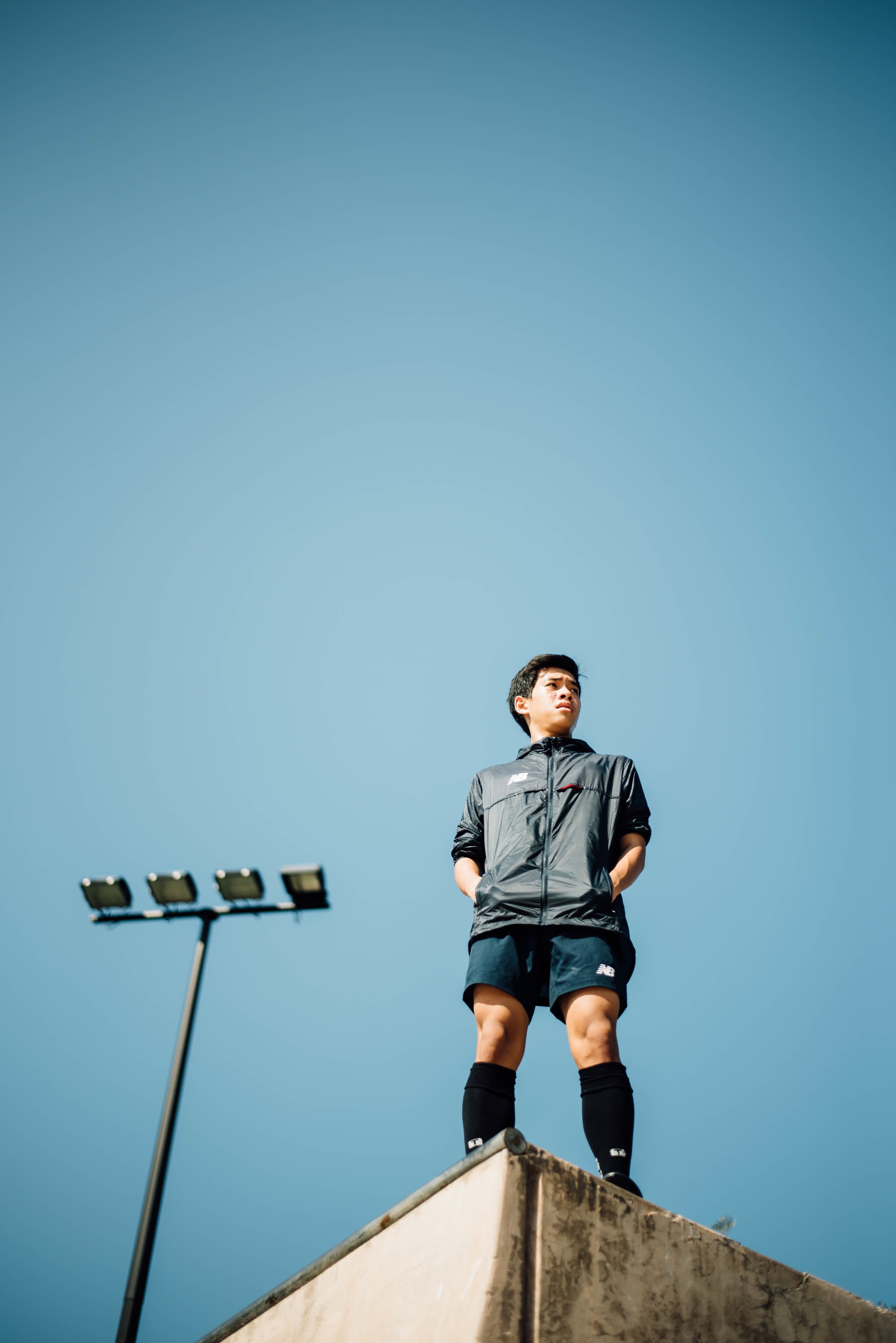 nature, young Adult, looking at camera, real people, on top, man, child, black, copy space, front view, blue shirts, sky, shirts, up, building, teenager, Phone HD Wallpaper