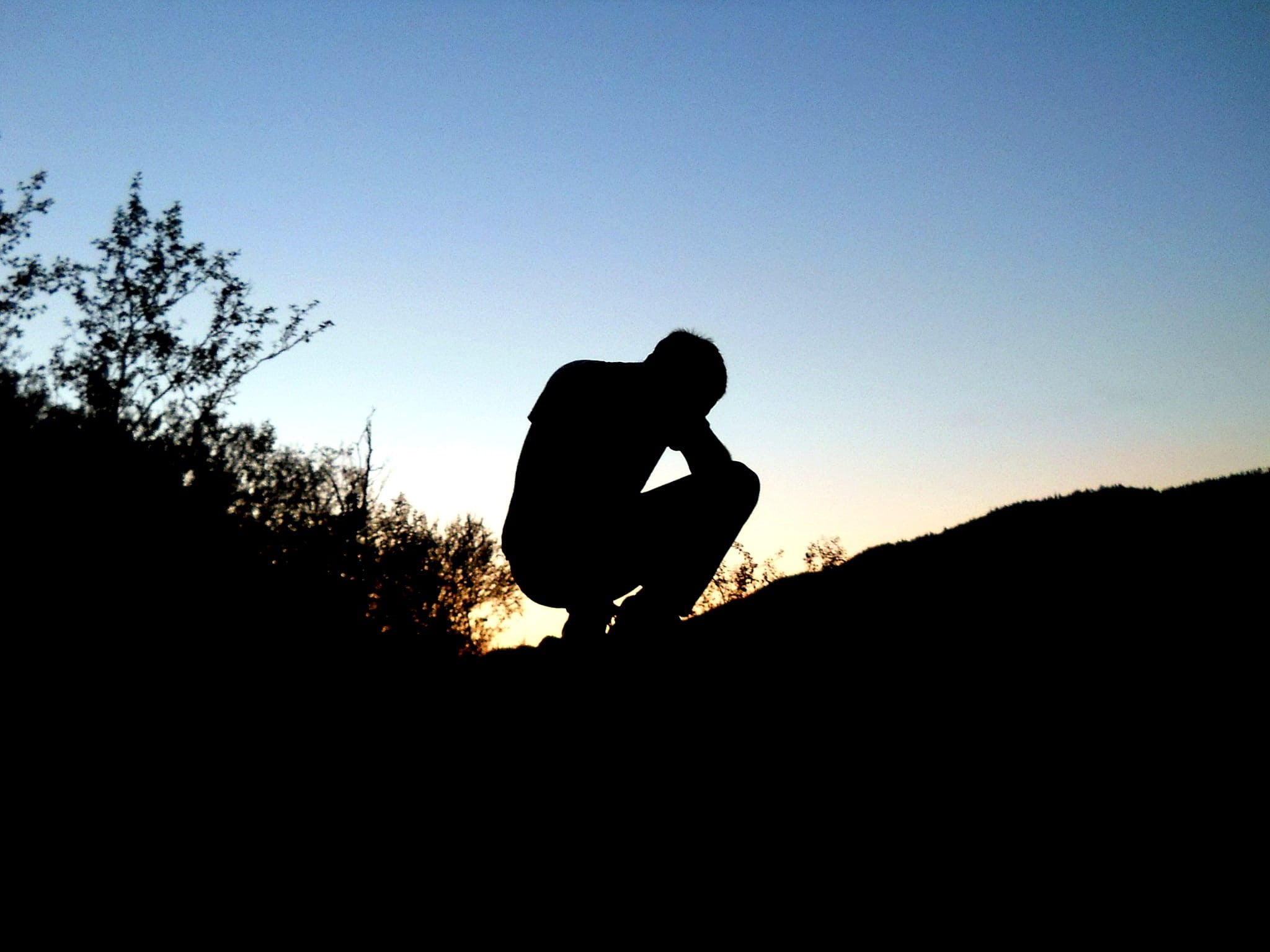 teenager, black, 1080P, sky, adult, squatting, leisure activity, light, men, dark, the phantom, nature, curved, prostration, contrast, people, one person, HD Wallpaper