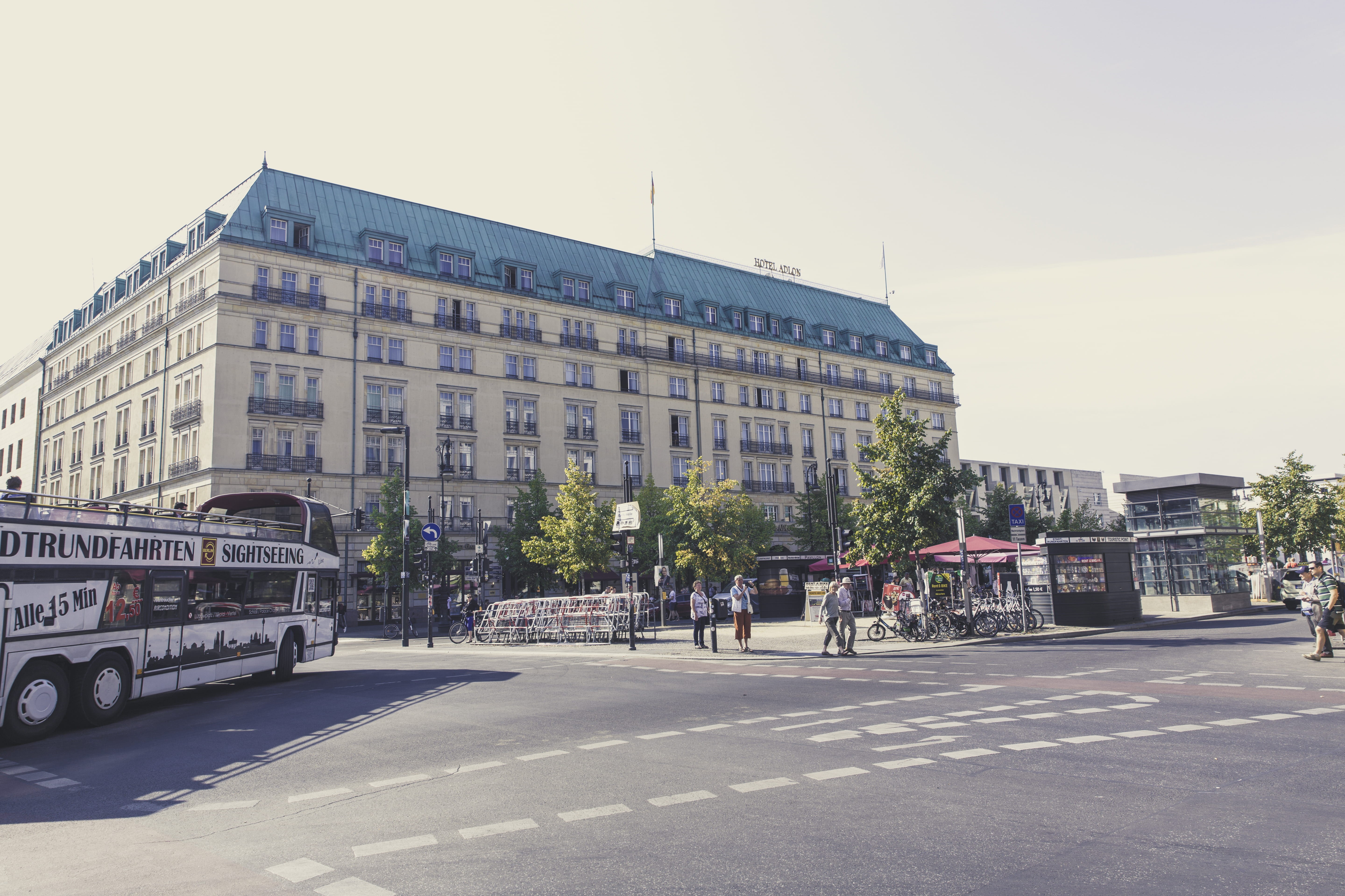 road marking, built structure, people, building exterior, marking, cityscape, motor vehicle, hotel adlon, transportation system, architecture, town, automobile, HD Wallpaper