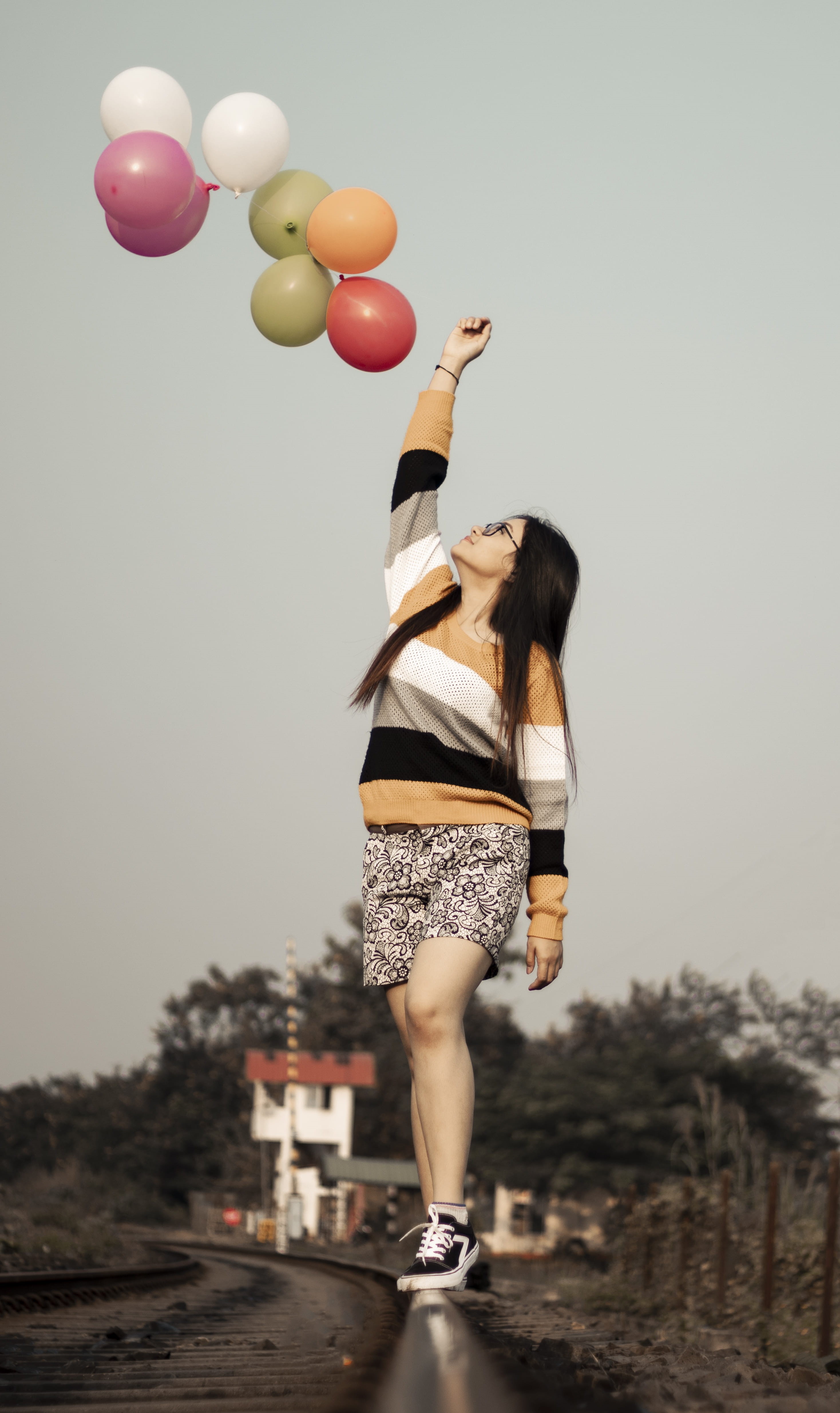 balloon, nature, girl, women, human, guwahati, summer, young women, one person, young adult, sleeve, multicolored, standing, human arm, full length, balloons, Phone HD Wallpaper