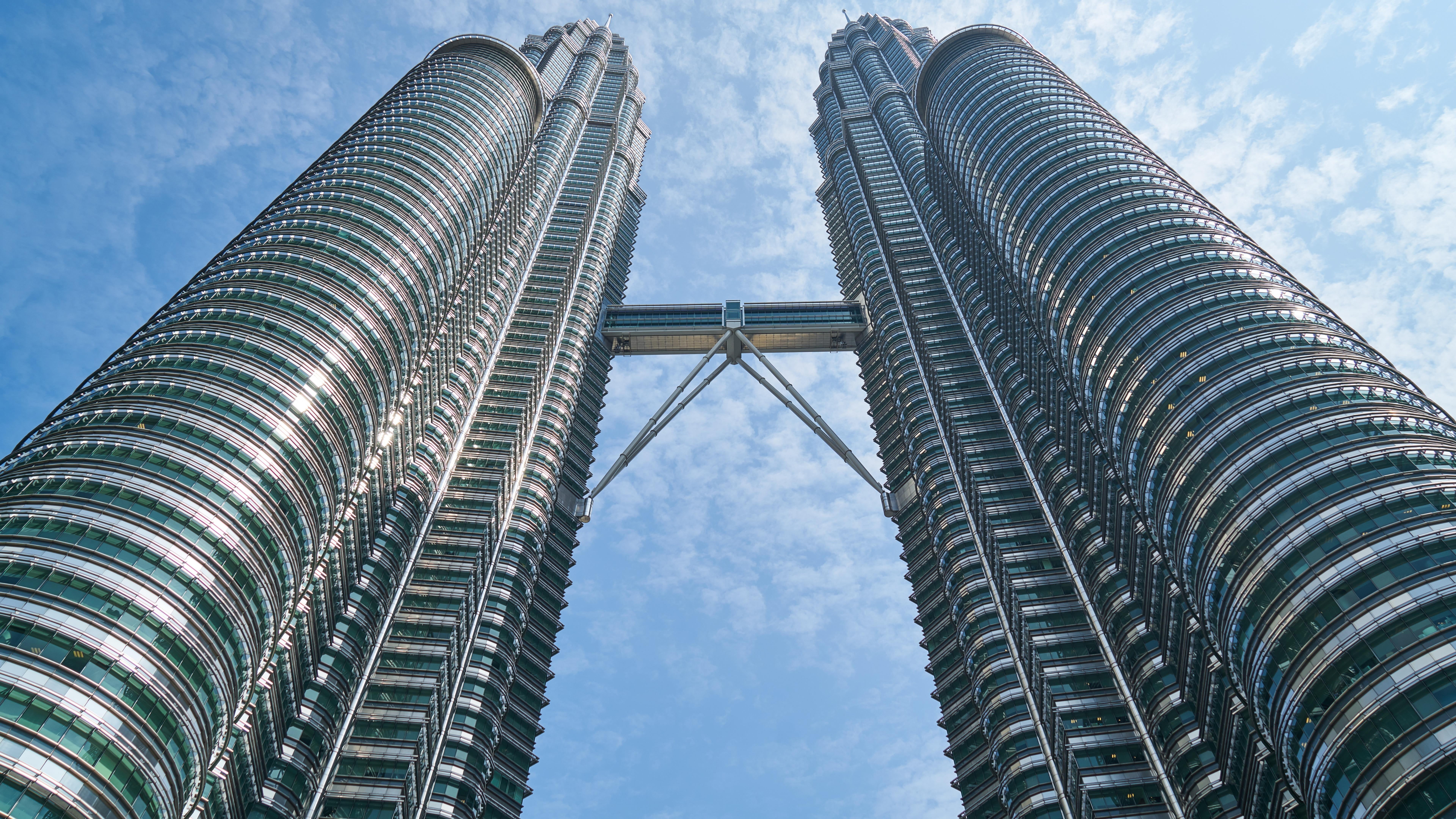 tower, spire, city, kuala lumpur, asia, travel destinations, metropolitan, architecture, tourism, directly below, petronas, day, modern, malaysia, no people, HD Wallpaper