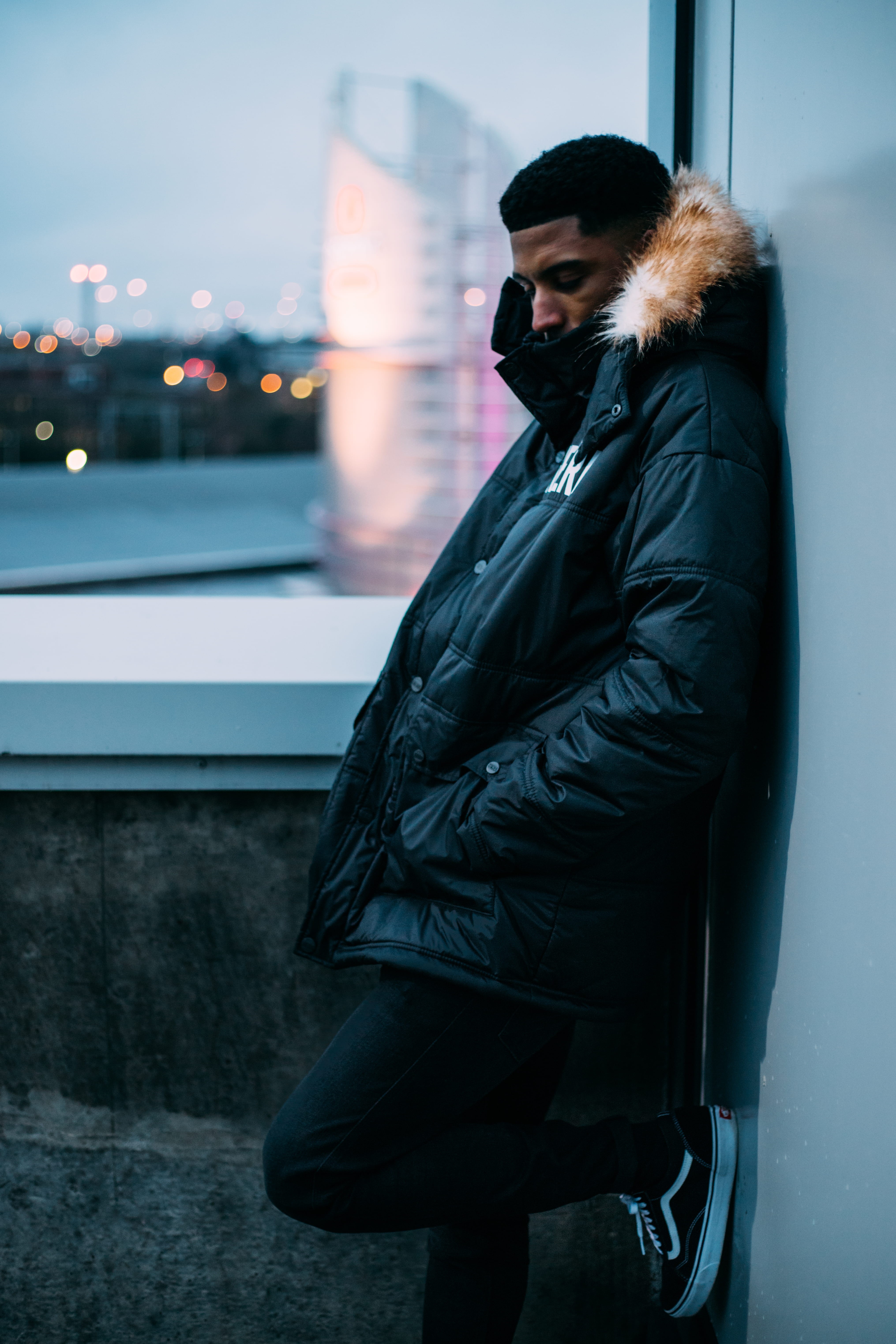 black, leather, side view, clothing, architecture, leisure activity, city, leather jacket, man, near, looking, photography, real people, beautiful woman, Phone HD Wallpaper