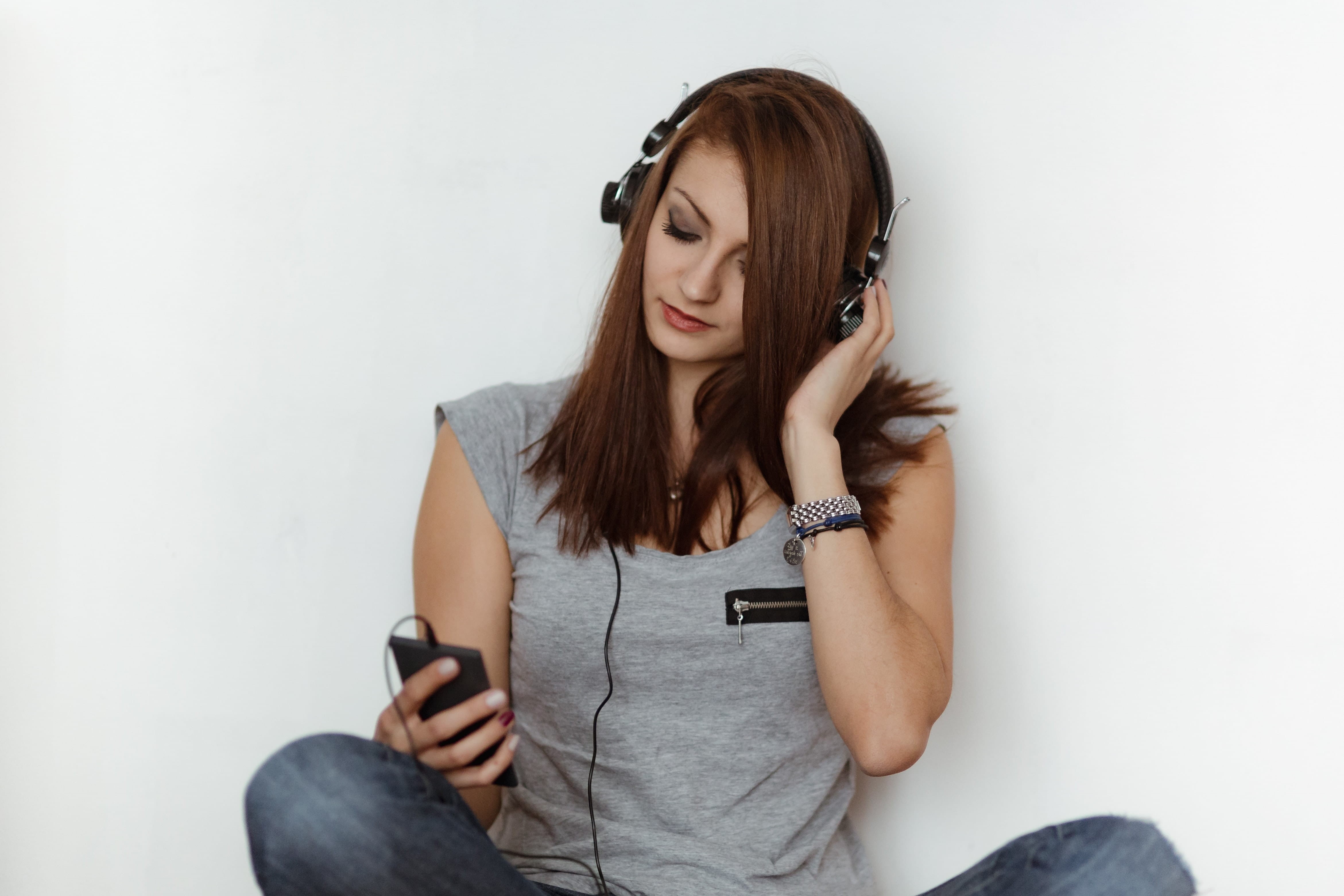 connection, alone, mobile phone, portrait, song, front view, lifestyle, holding, woman, caucasian, headphones, beauty, spotify, mp3 player, pretty, attractive, HD Wallpaper