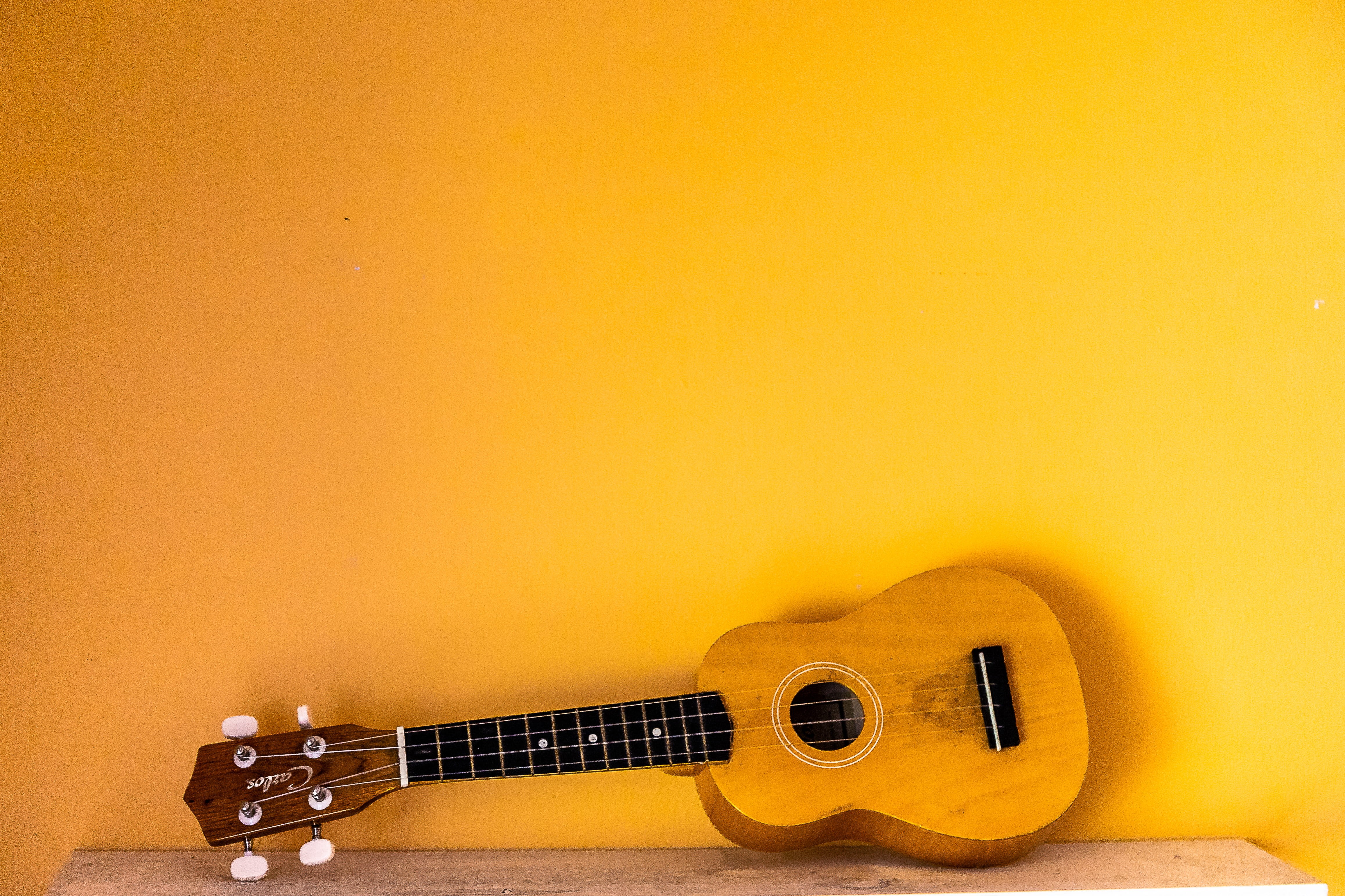 arts culture and entertainment, no people, bunker, close-up, single object, building, electrical device, yellow, guitar, musical instrument string, label, HD Wallpaper