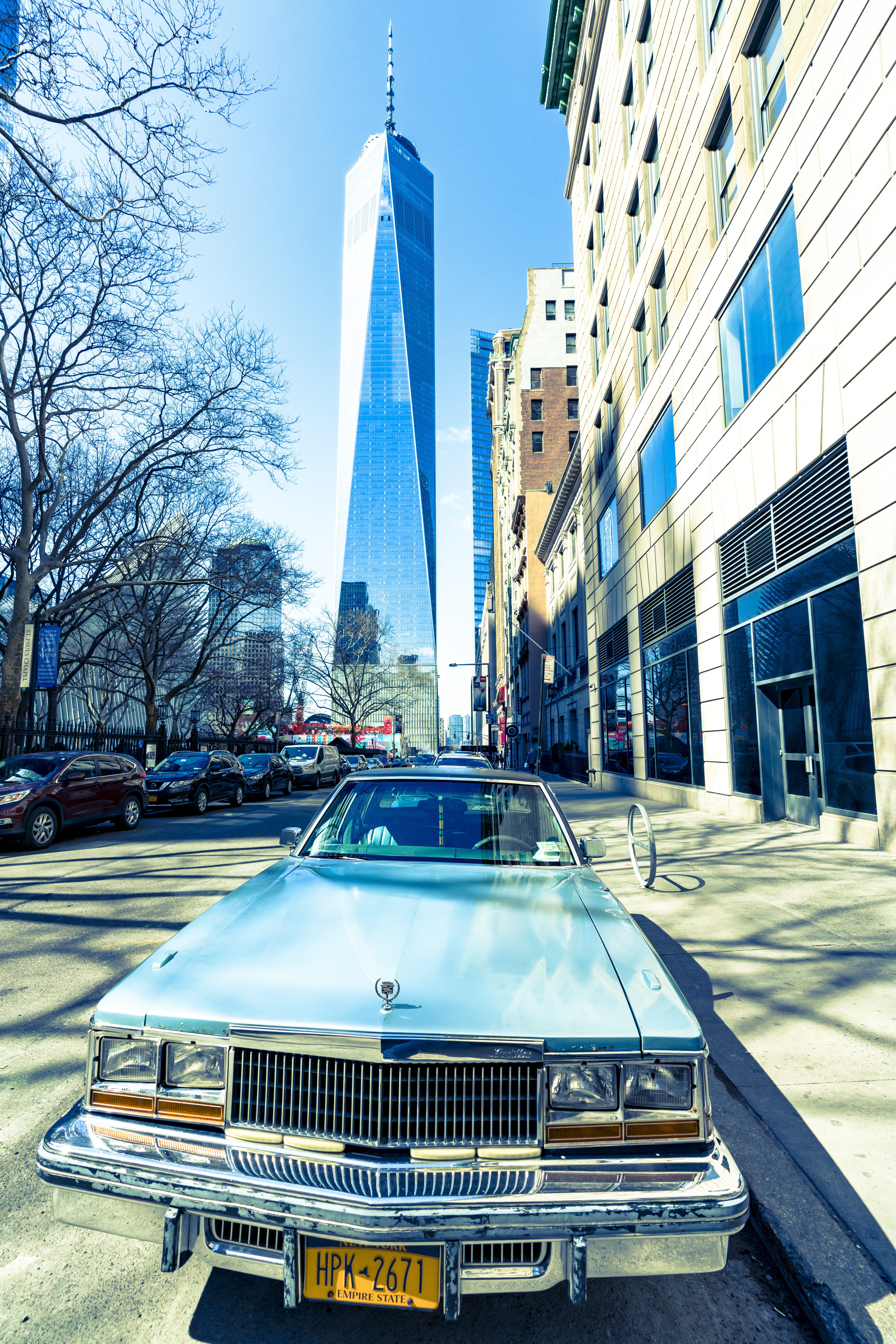 no people, architecture, tower, outdoors, modern, cadillac, transportation, downtown, sky, office building exterior, built structure, building, urban, steeple, Phone HD Wallpaper