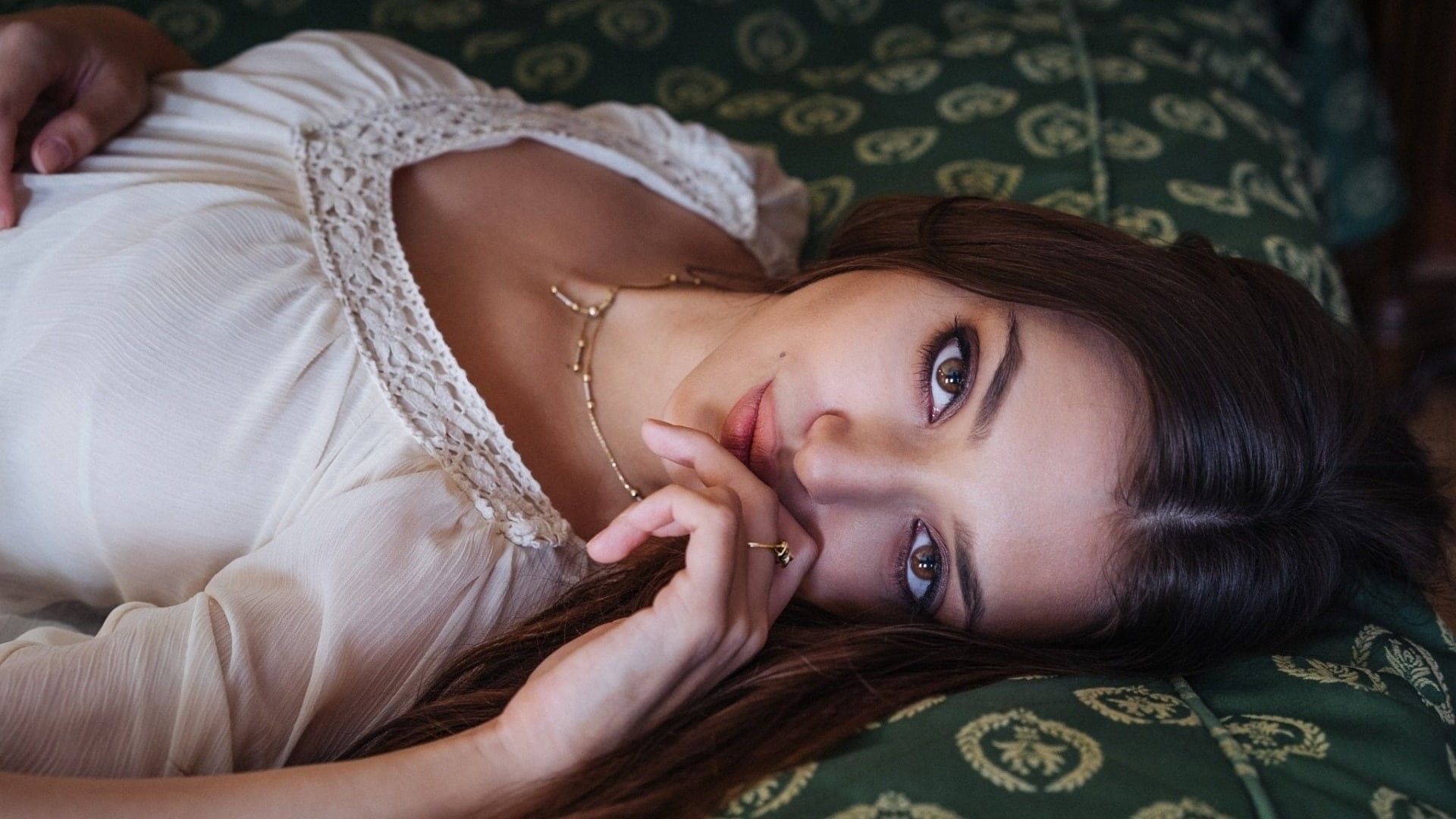 hairstyle, young women, women, front view, face, one person, model, hair, 1080P, beauty, lying on back, lying down, headshot, bed, furniture, finger on lips, HD Wallpaper