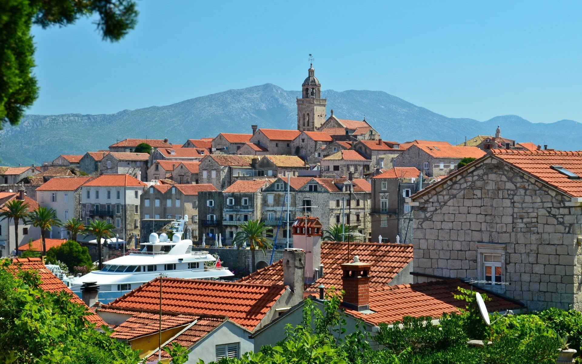outdoors, built structure, spirituality, clear sky, townscape, no people, city, mountain, rooftops, building exterior, building, residential district, roof tile, HD Wallpaper