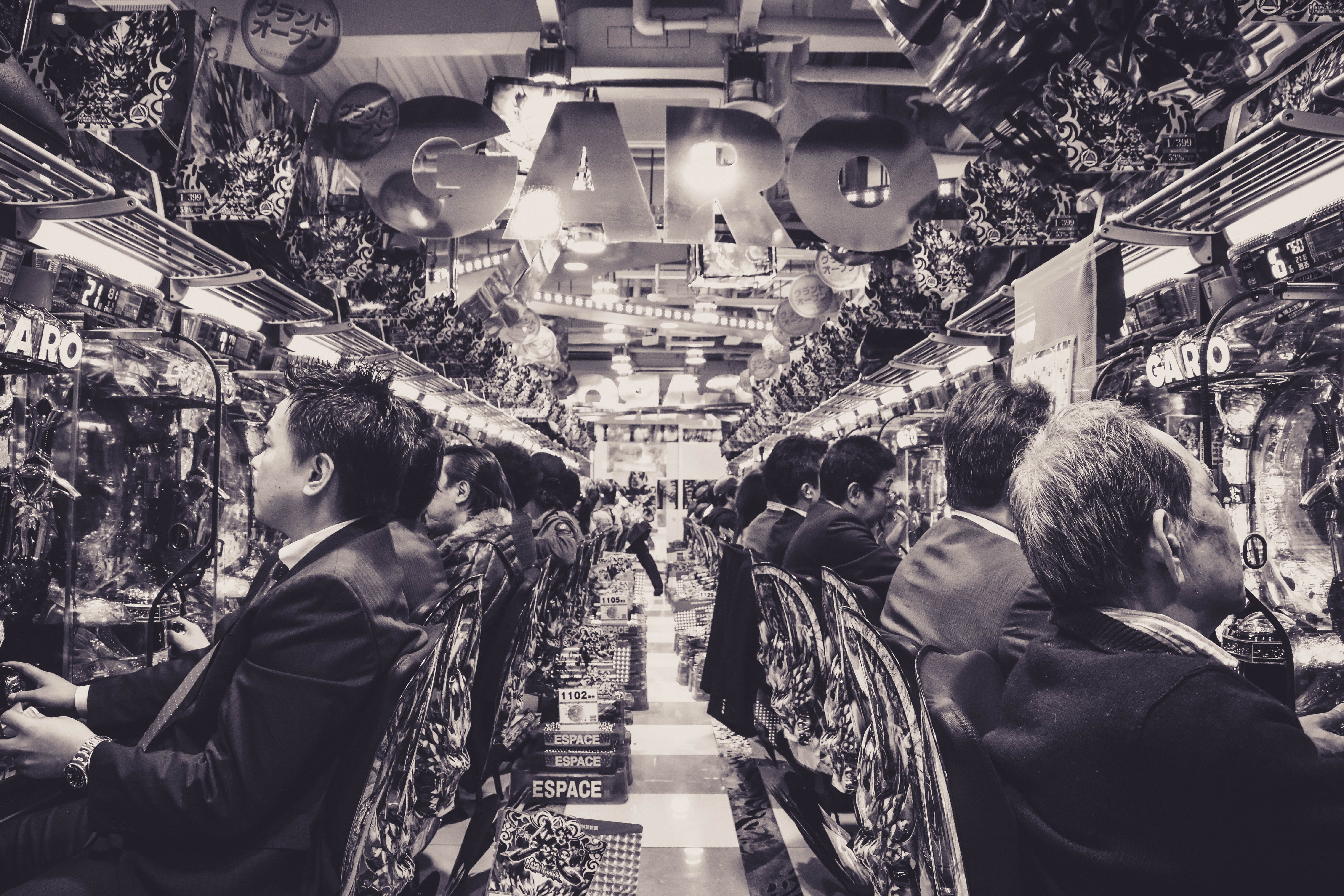 market, money, illuminated, arcade game machine, lighting equipment, pub, shopping, apparel, women, lifestyles, group of people, walking, buying, city life, HD Wallpaper