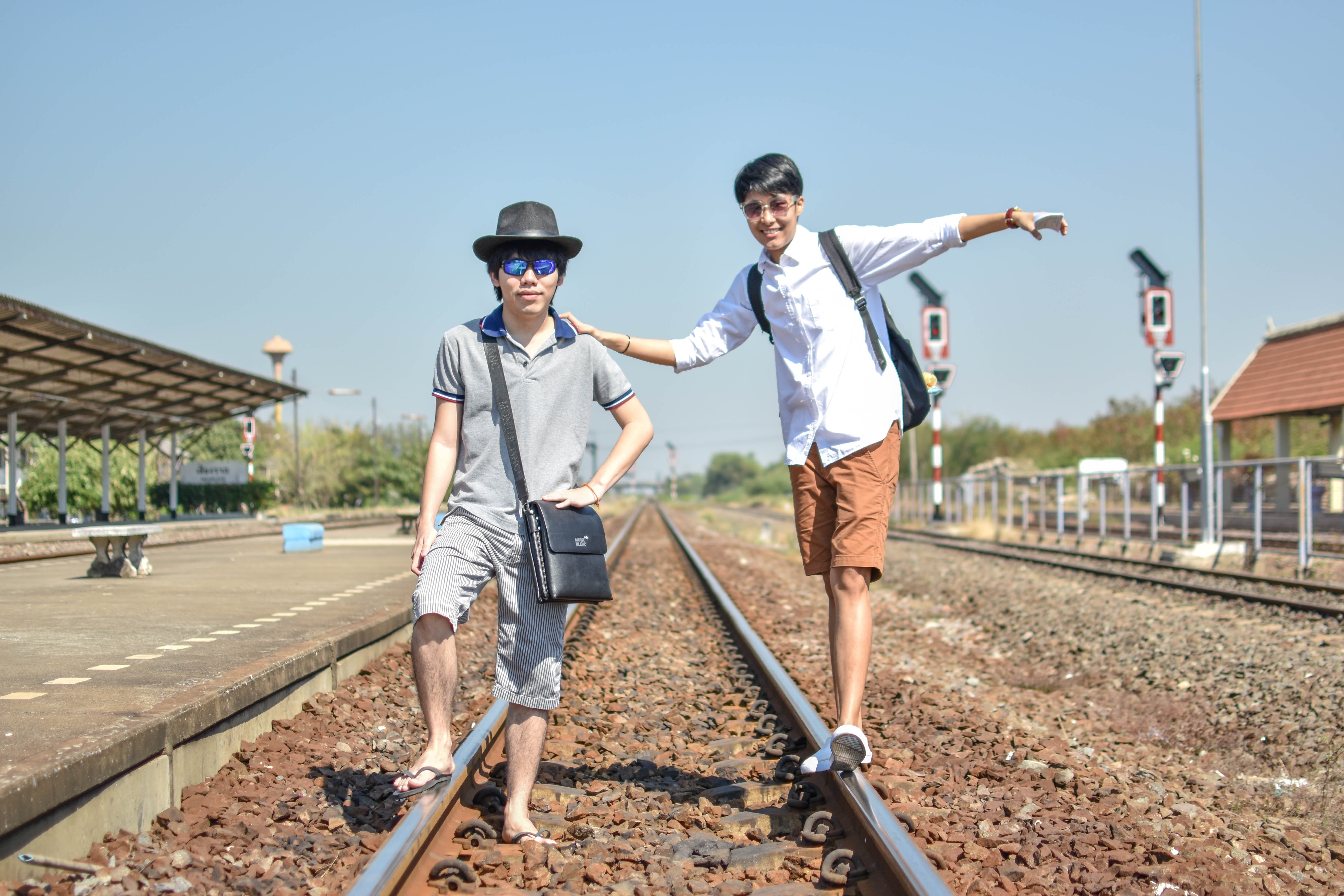 leisure activity, station, thailand, track, men, son, railroad track, casual clothing, adult, 5K, adults only, front view, full length, person, railroad, HD Wallpaper