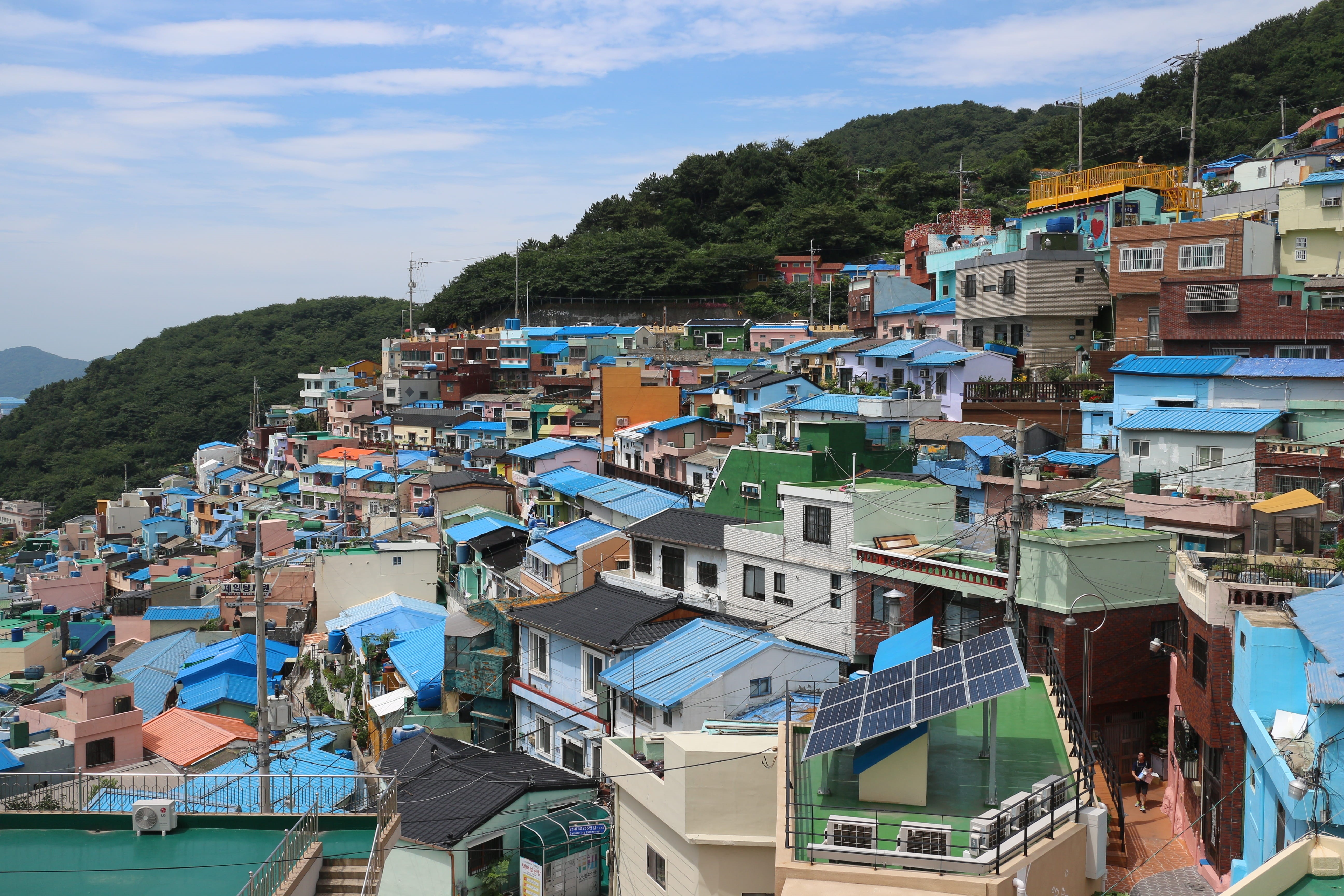 high angle view, water, painted mural village, plant, outdoors, sky, day, town, residential district, architecture, cloud - sky, mountain, house, townscape, HD Wallpaper