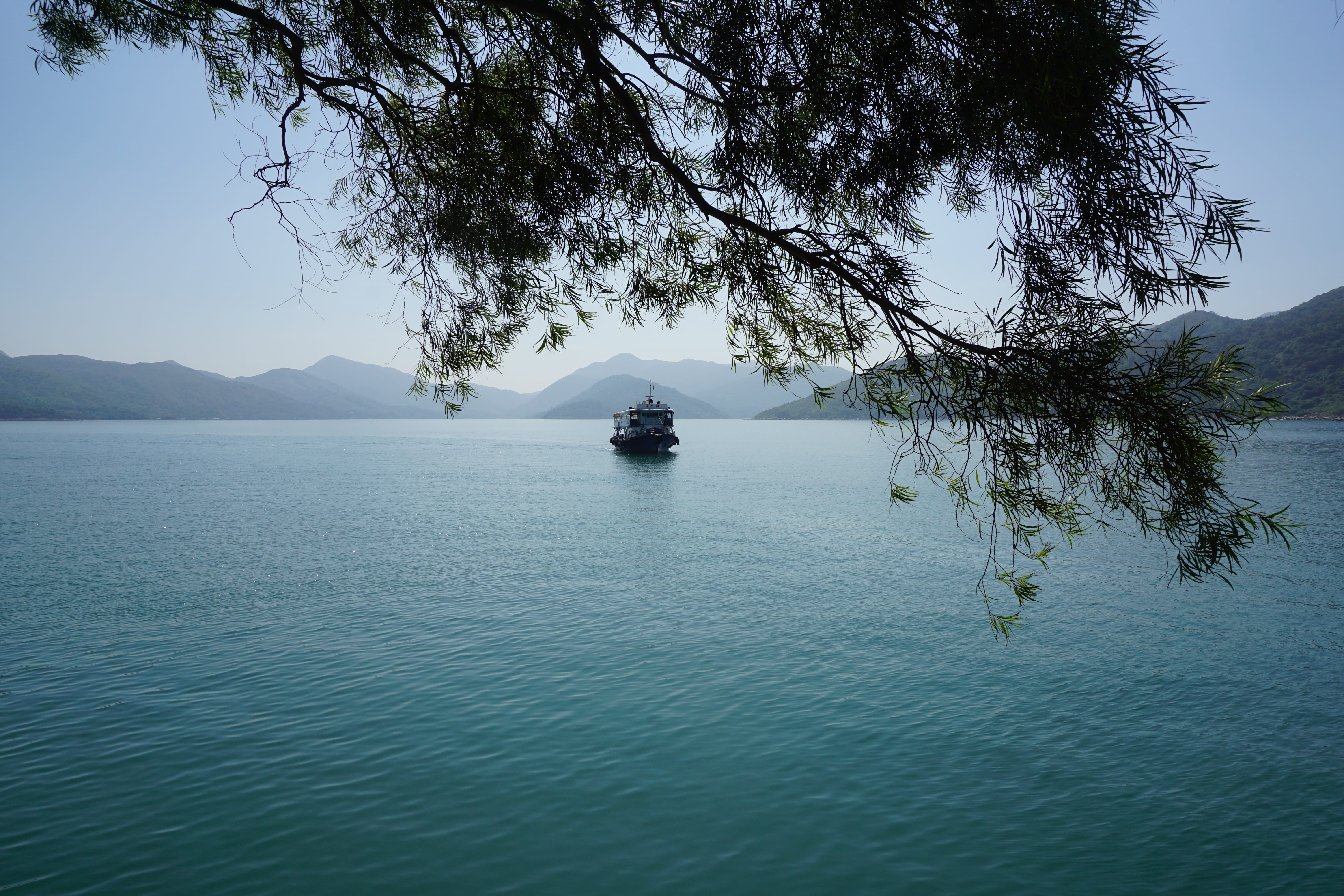 non-urban scene, mountain, waterfront, idyllic, tranquil scene, beauty in nature, transportation, nature, hong kong, sky, day, mode of transportation, tree, HD Wallpaper