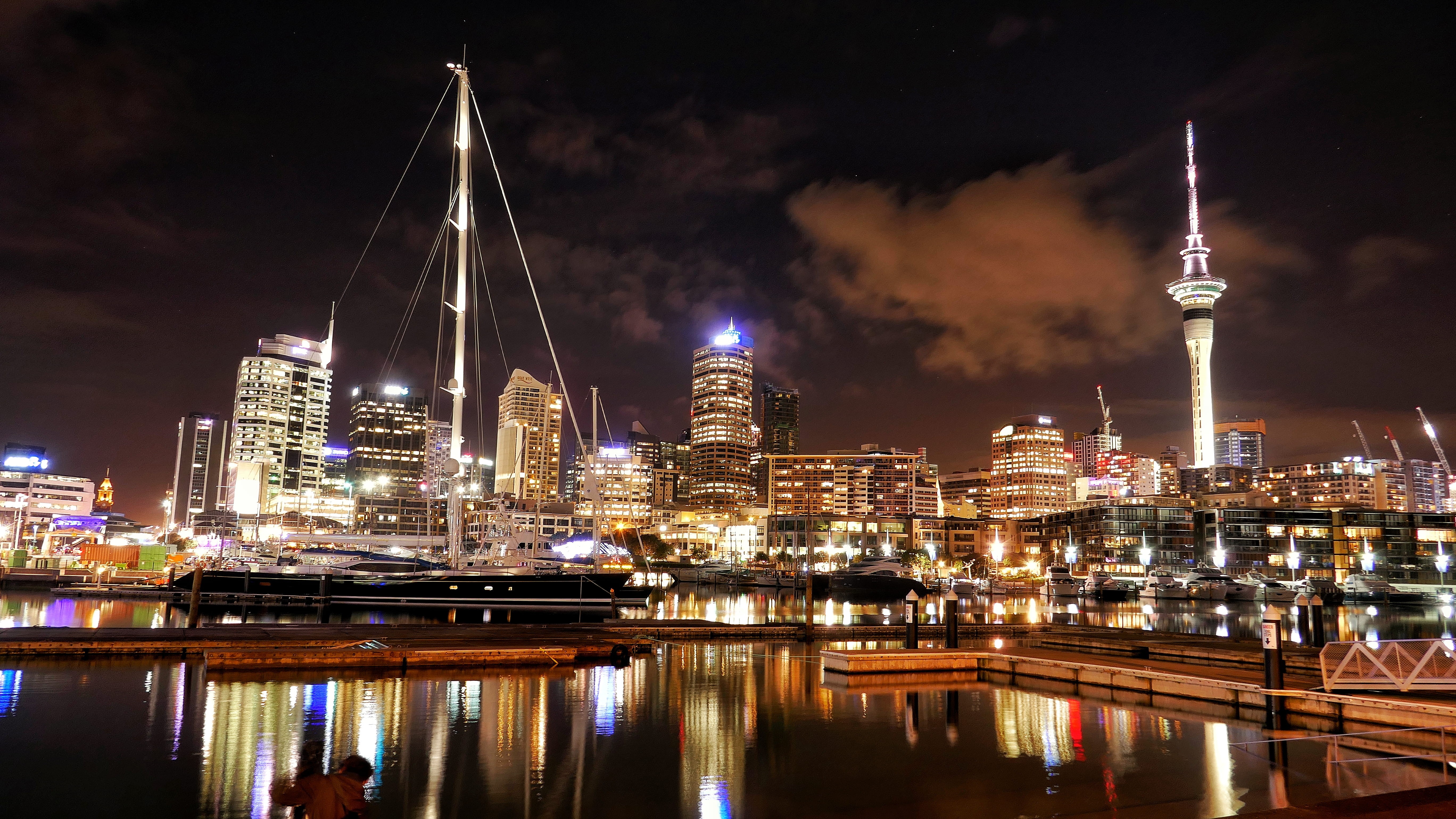no people, city, illuminated, financial district, built structure, spire, skytower, harbour, landscape, building exterior, modern, sail, water, river, viaduct basin, HD Wallpaper