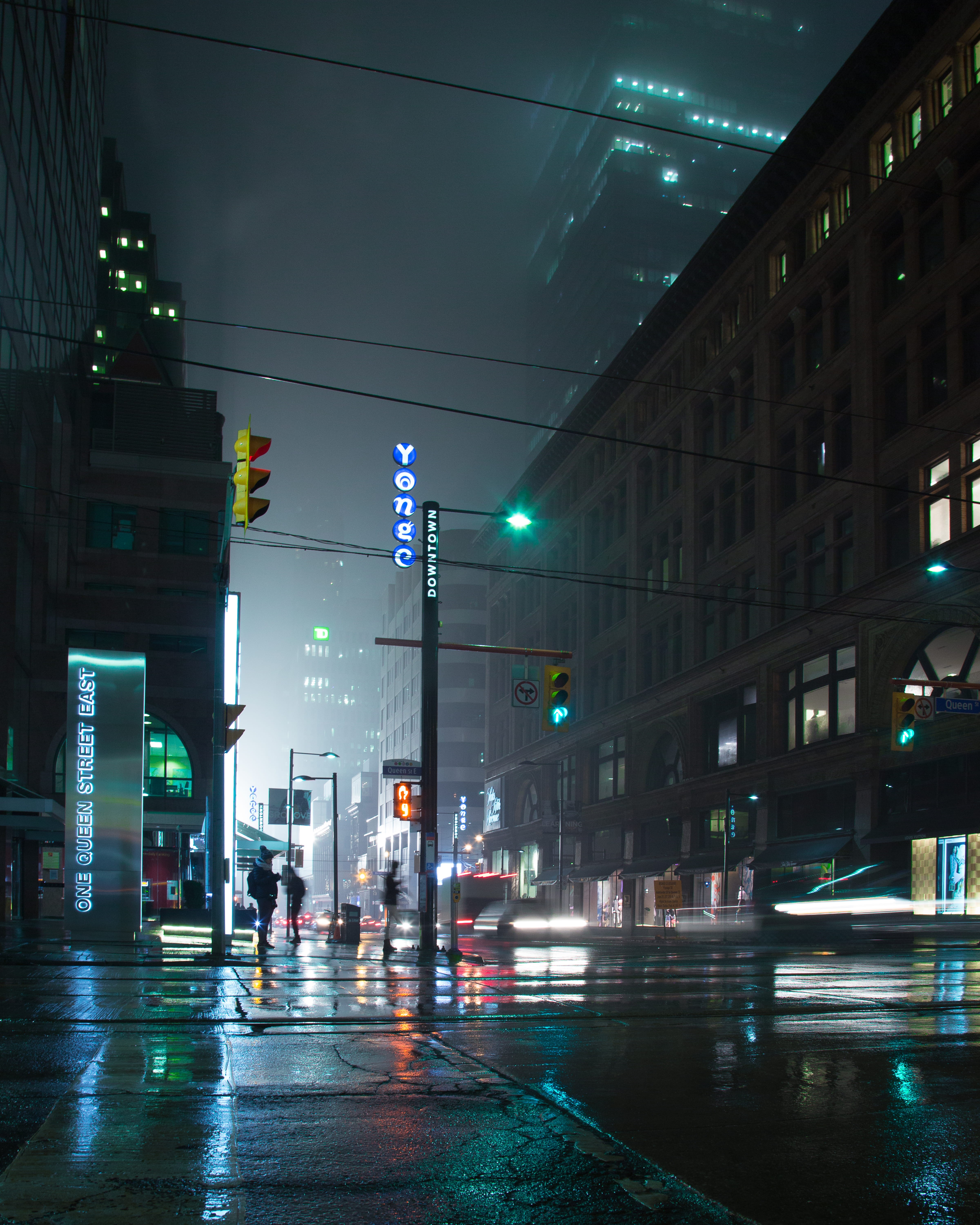 built structure, incidental people, electricity, nightlights, rain, outdoors, city life, lamp, road, dark, mist, city, wet, near, building exterior, building, Phone HD Wallpaper