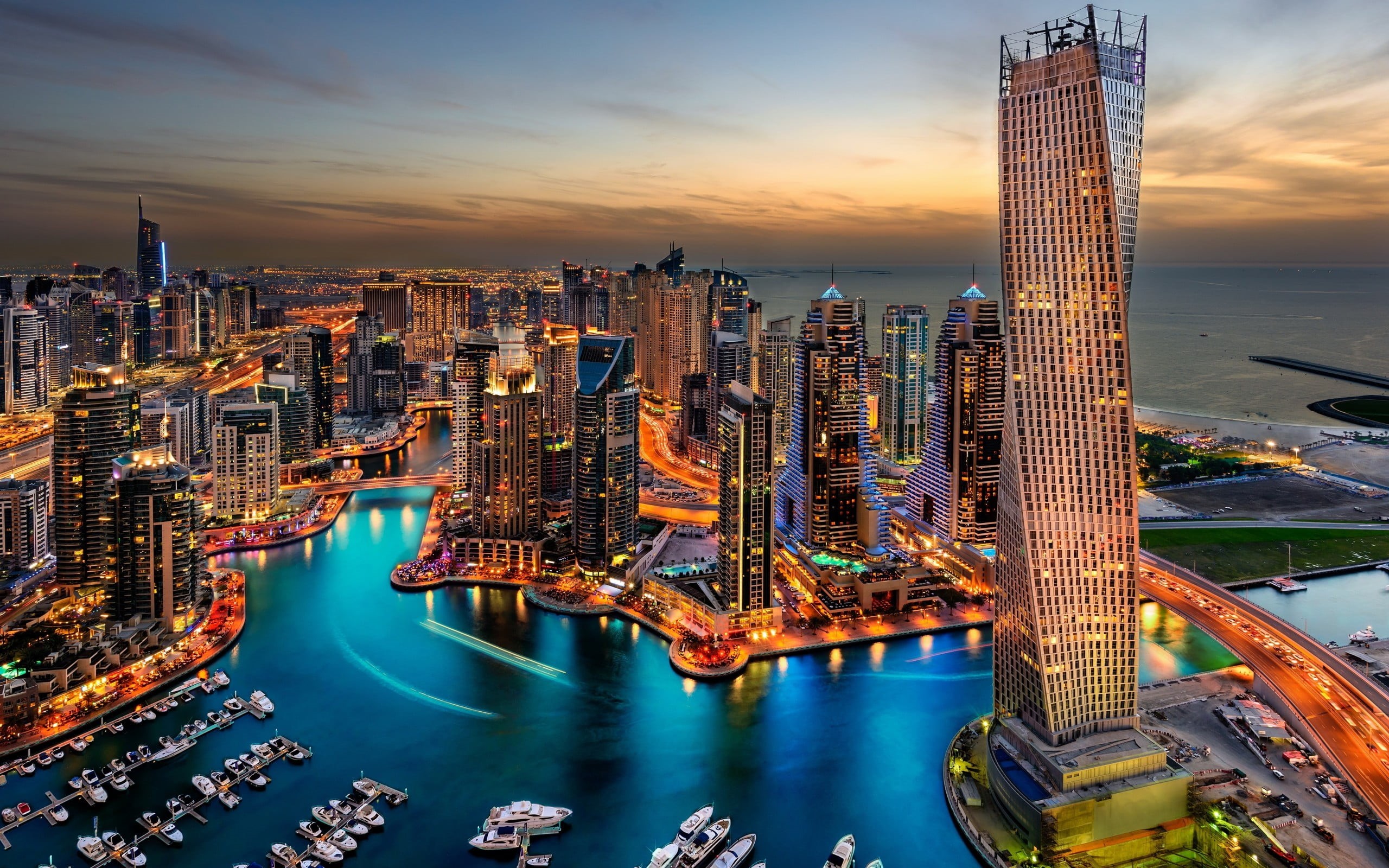 illuminated, built structure, 2K, financial district, travel destinations, water, tower, cityscape, bridge - man made structure, city lights, boat, building exterior, HD Wallpaper