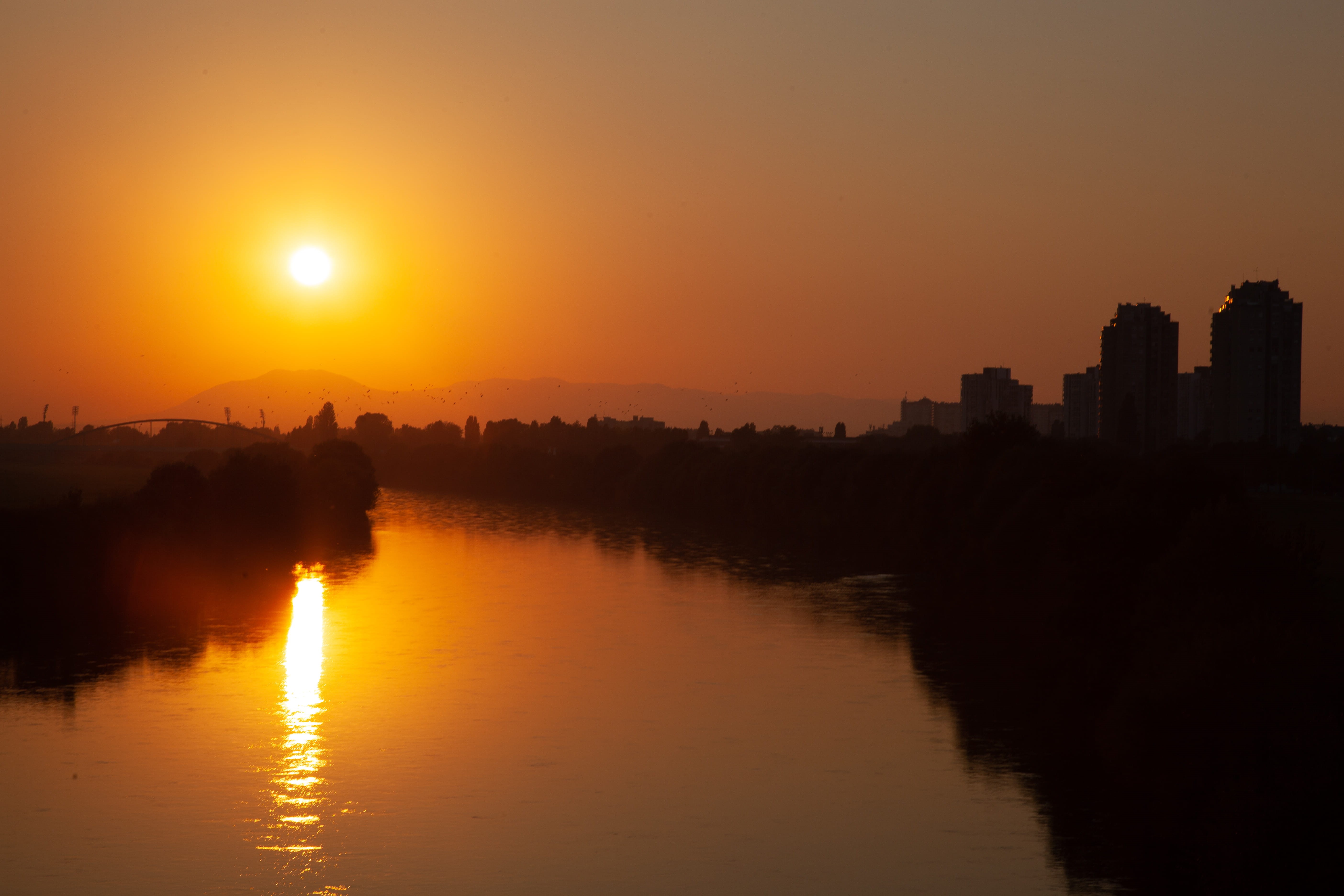 sunset, 5K, silhouette, zagreb, orange color, architecture, beauty in nature, romantic sky, tranquil scene, sun, tranquility, sky, cityscape, built structure, HD Wallpaper