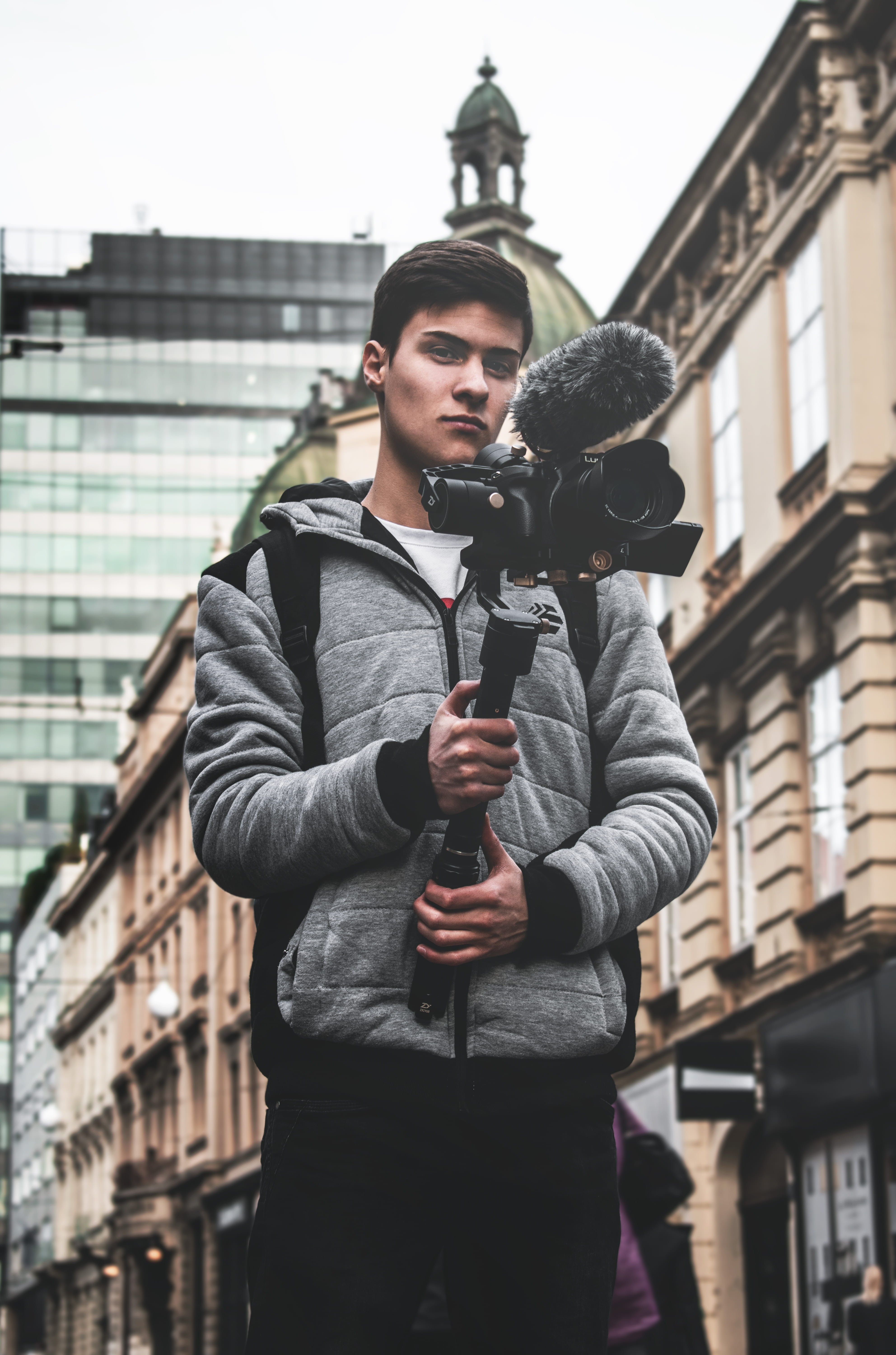 photographer, man, tower, outdoors, near, technology, apparel, portrait, street, architecture, face, electronics, young men, clothing, human, camera, photo, Phone HD Wallpaper