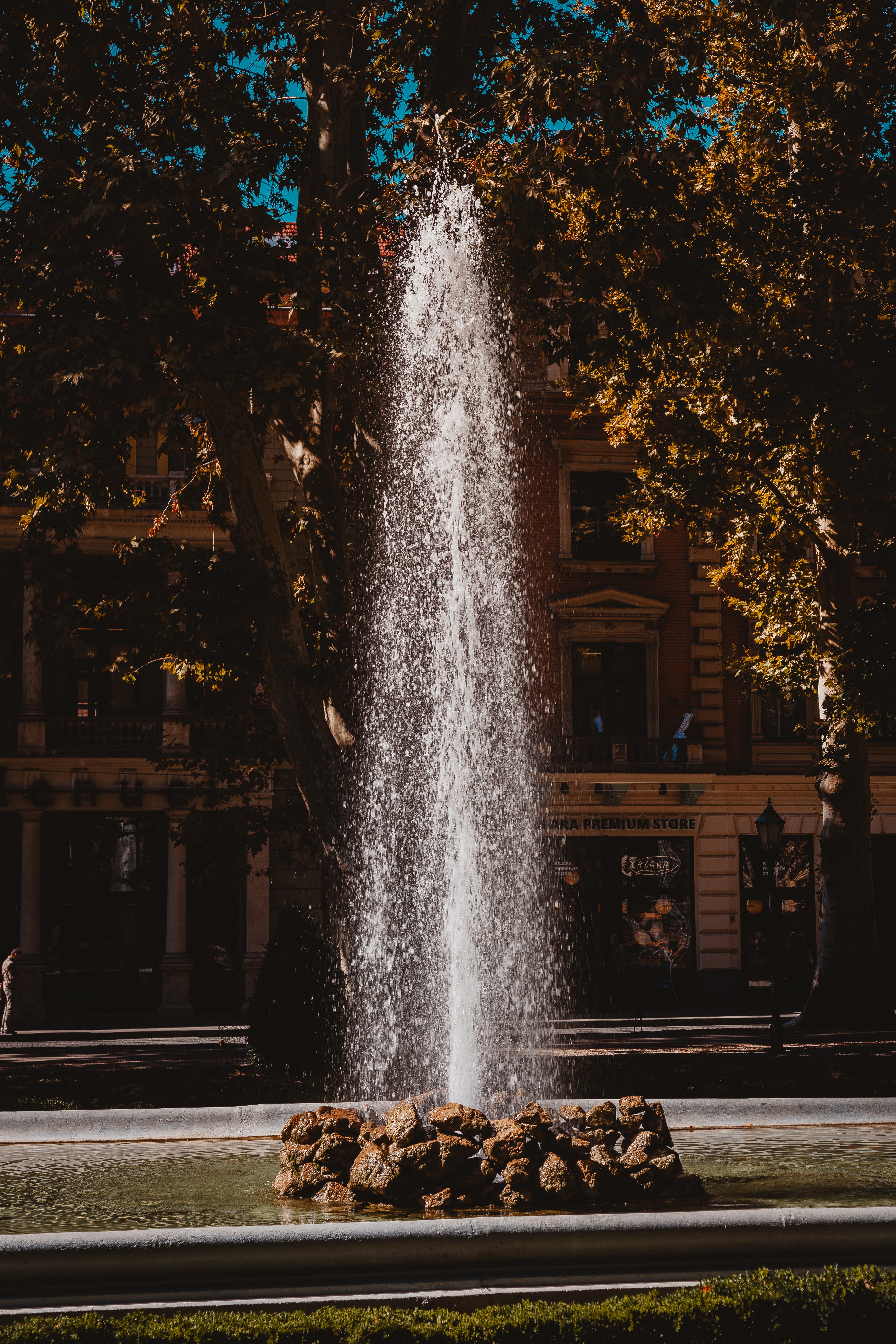 spraying, flowing, built structure, fountain, beauty in nature, zrinjevac, long exposure, water, no people, blurred motion, tree, architecture, flowing water, Phone HD Wallpaper