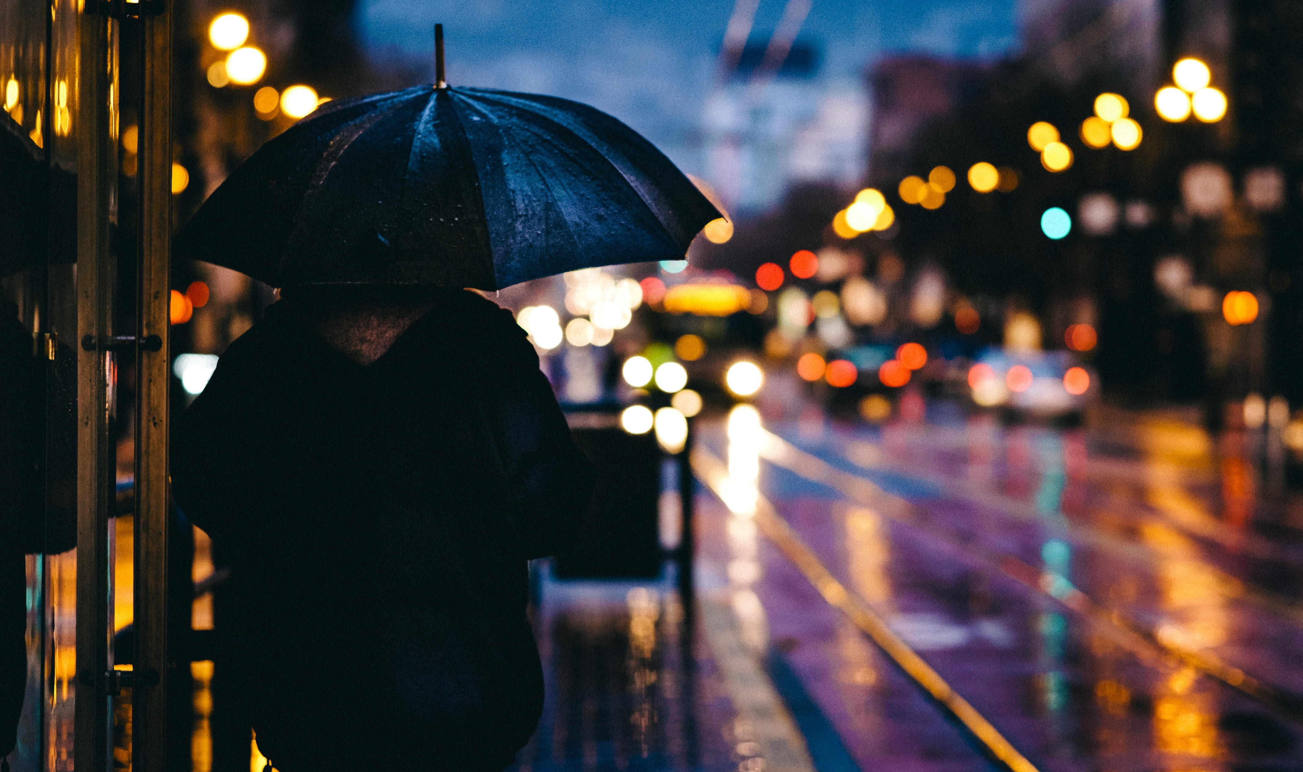 reflection, rain, men, time, city life, bokeh, water, standing, rainy season, blur, holding, man, night, road, wet, city, person, focus on foreground, outdoors, HD Wallpaper