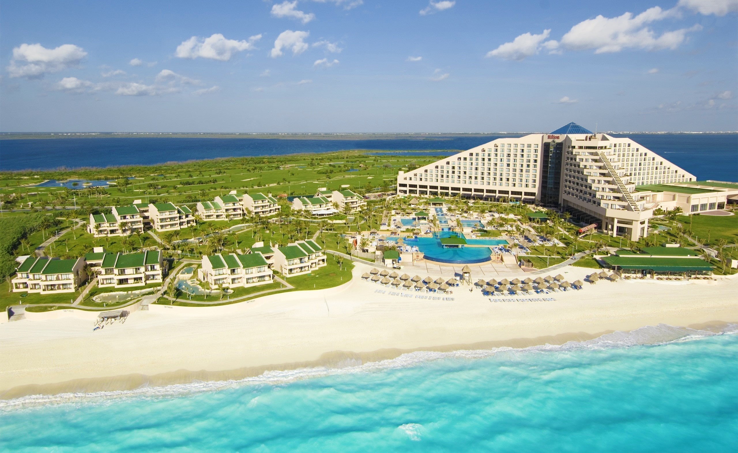 building exterior, swimming pool, no people, luxury, building, travel destinations, day, architecture, sea, beach, sky, waterfront, Mexico, city, built structure, HD Wallpaper