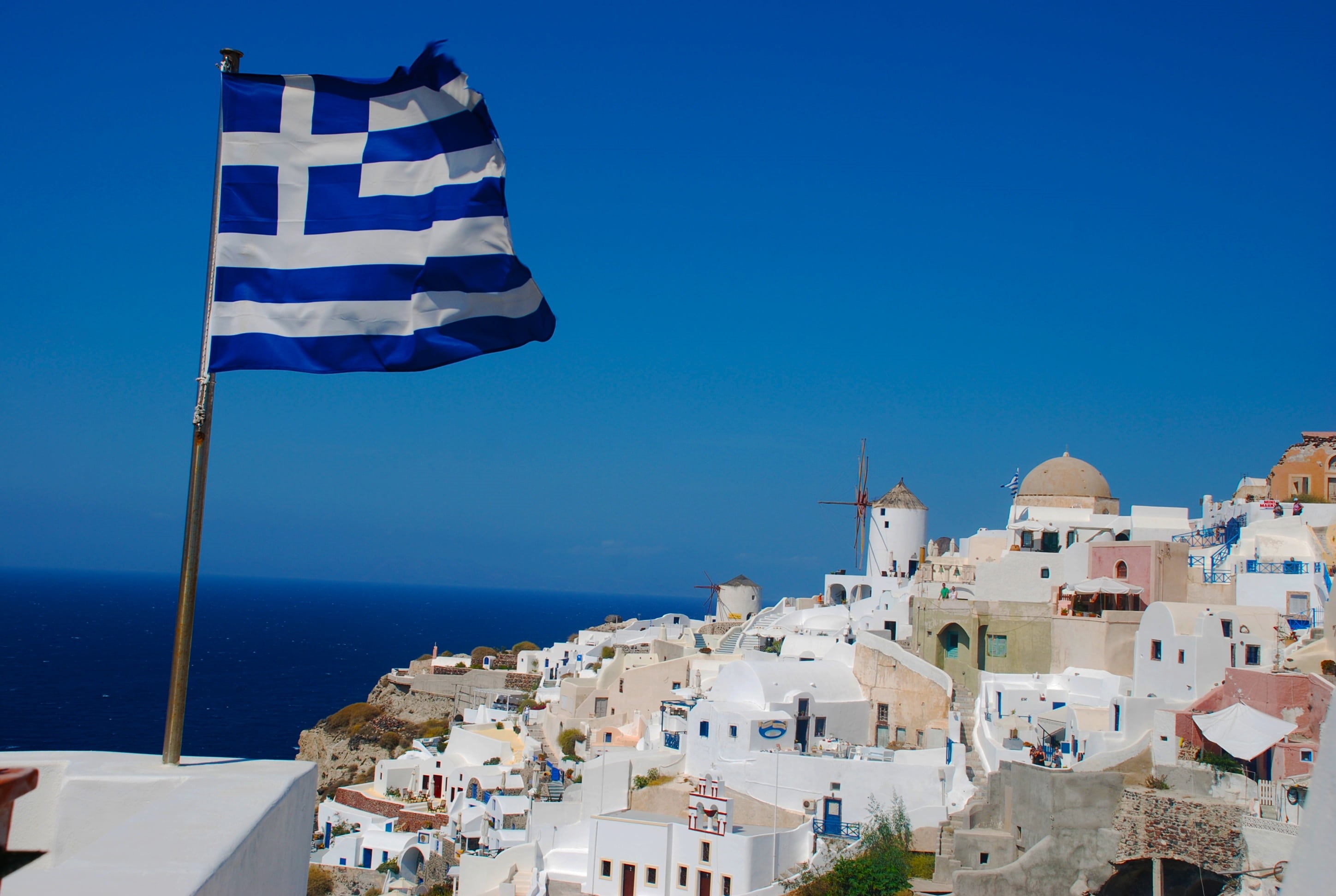 horizon over water, land, travel, aegean Sea, blue, architecture, vacations, patriotism, caldera, built structure, day, outdoors, famous Place, town, mediterranean Sea, HD Wallpaper