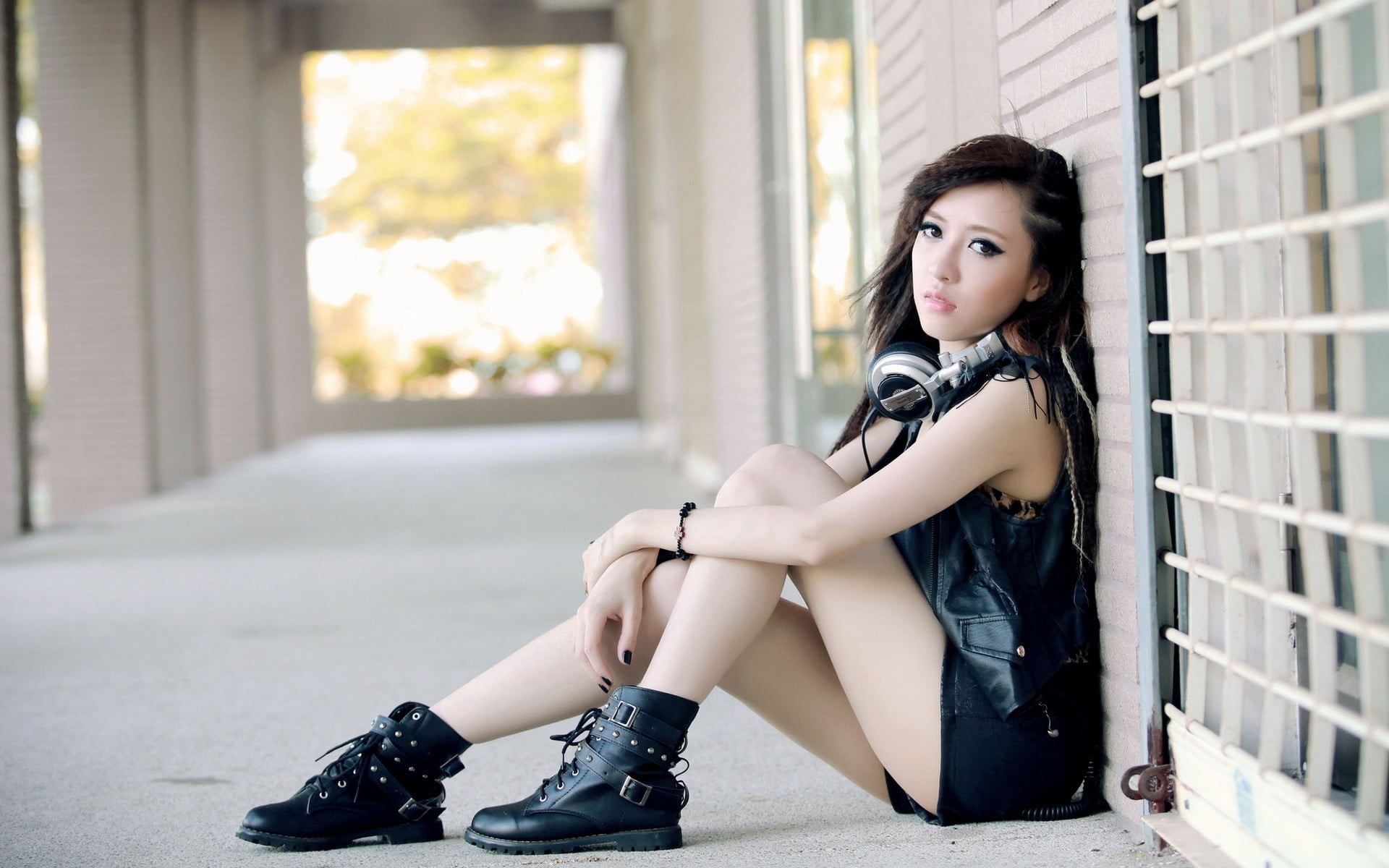sitting, woman, top, wall, clothing, 1080P, Black clothes, young women, headphones, hair, model, black, full length, one person, portrait, shorts, teenager, HD Wallpaper