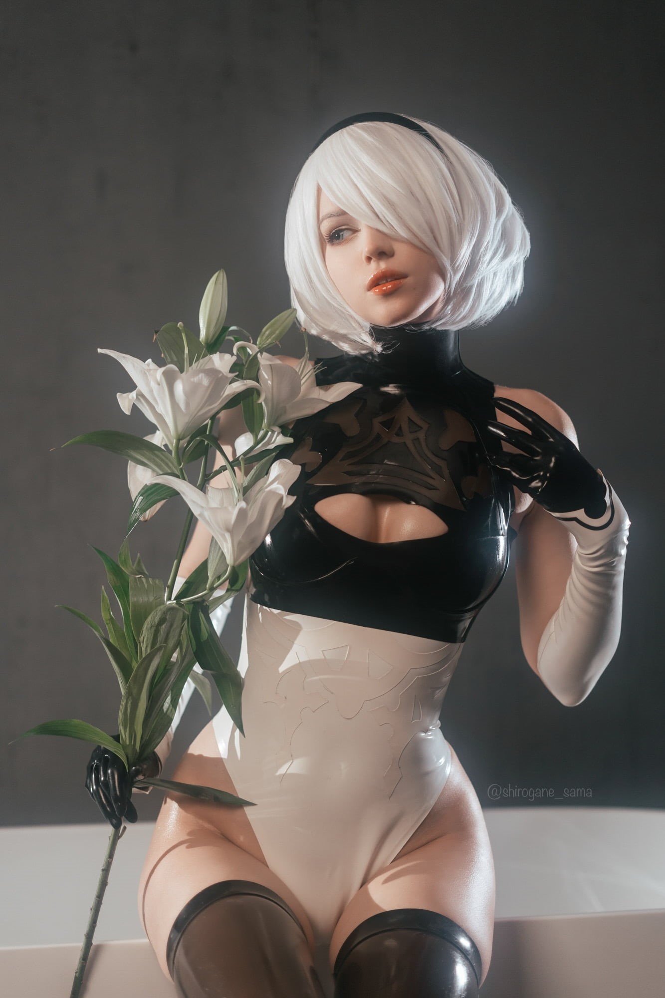 2B (Nier: Automata), cosplay, arm warmers, indoors, video games, bodysuit, women indoors, 2B, flowers, video game characters, women, video game girls, model, Phone HD Wallpaper