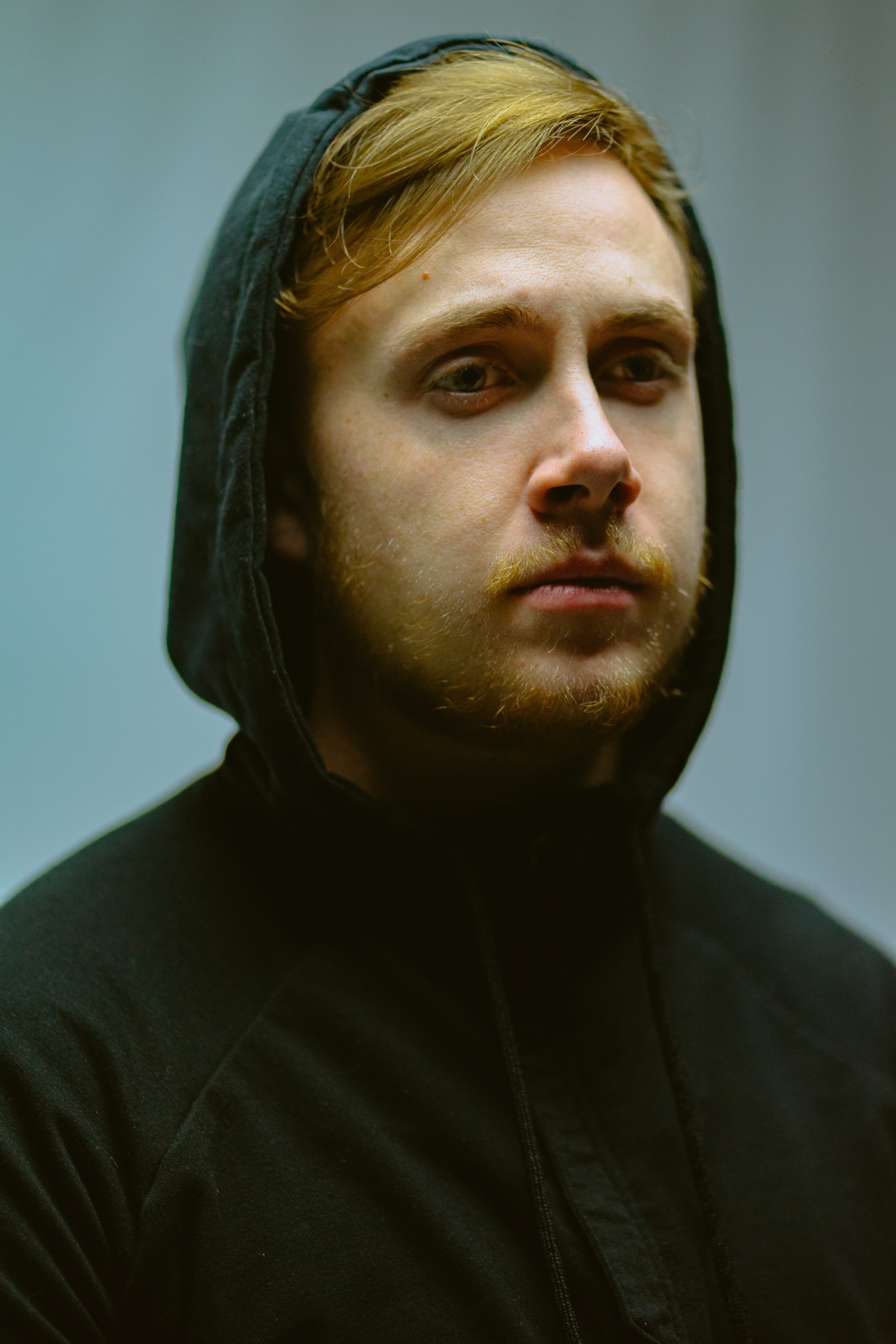 thinking, young Adult, color Image, human Face, resemblance, close-up, hood - Clothing, ryan gosling, hood, red head, caucasian Ethnicity, adult, studio Shot, Phone HD Wallpaper