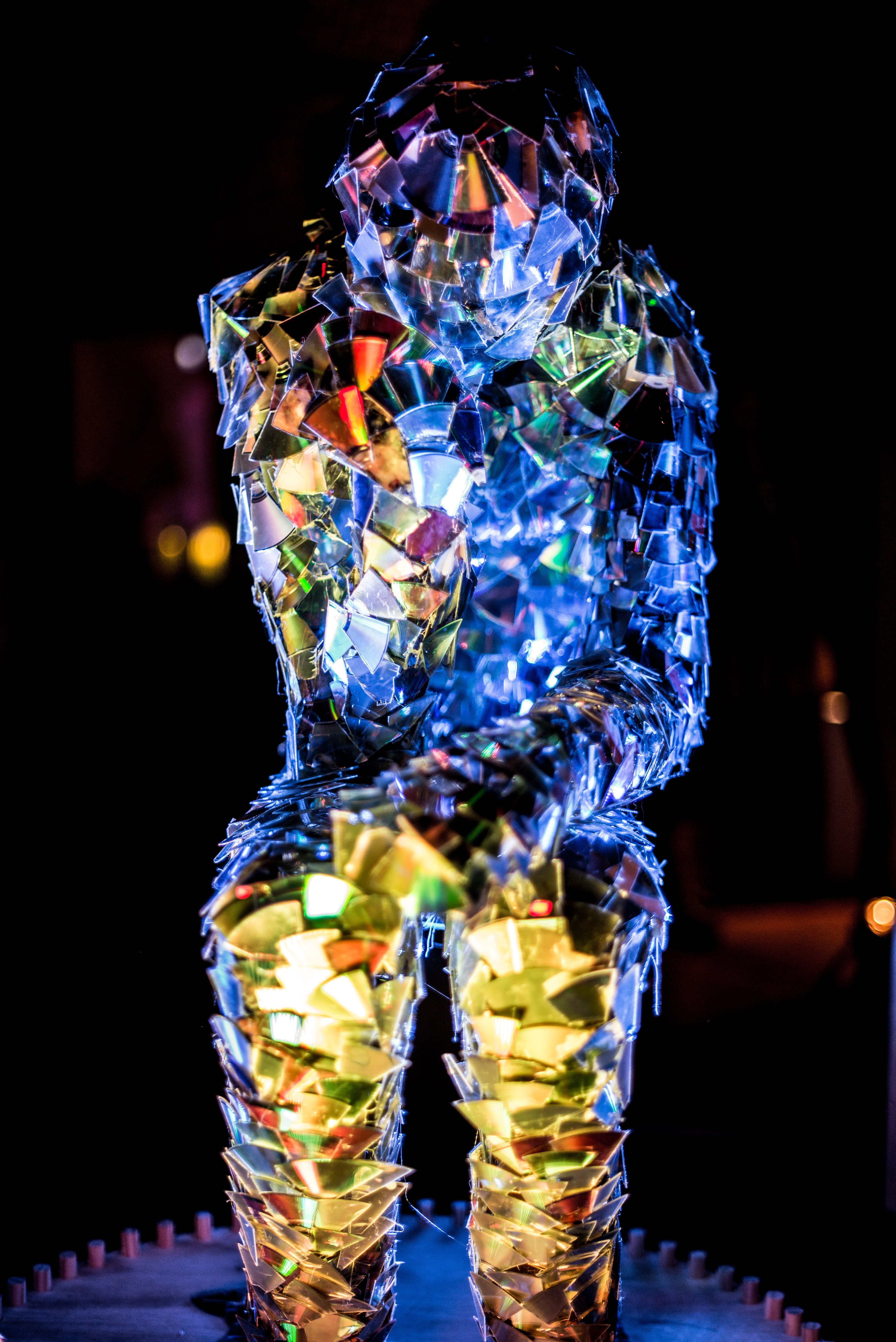 illuminated, man, the thinker, focus on foreground, creativity, male, Cd, sitting, pattern, indoors, one person, glass, standing, modern, no people, cds, Phone HD Wallpaper