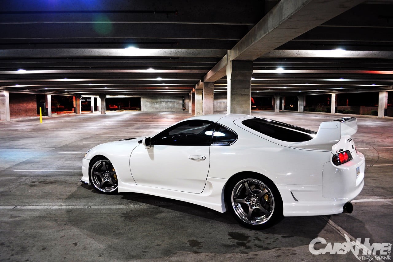 sports car, indoors, illuminated, wealth, parking, coupe, mode of transportation, Toyota Supra, parking garage, city, architectural column, no people, architecture, HD Wallpaper
