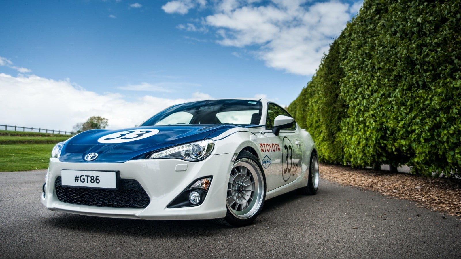 motor vehicle, day, retro styled, outdoors, land vehicle, 720P, transportation, car, sky, no people, plant, green color, tree, nature, sunlight, Toyota GT86, HD Wallpaper