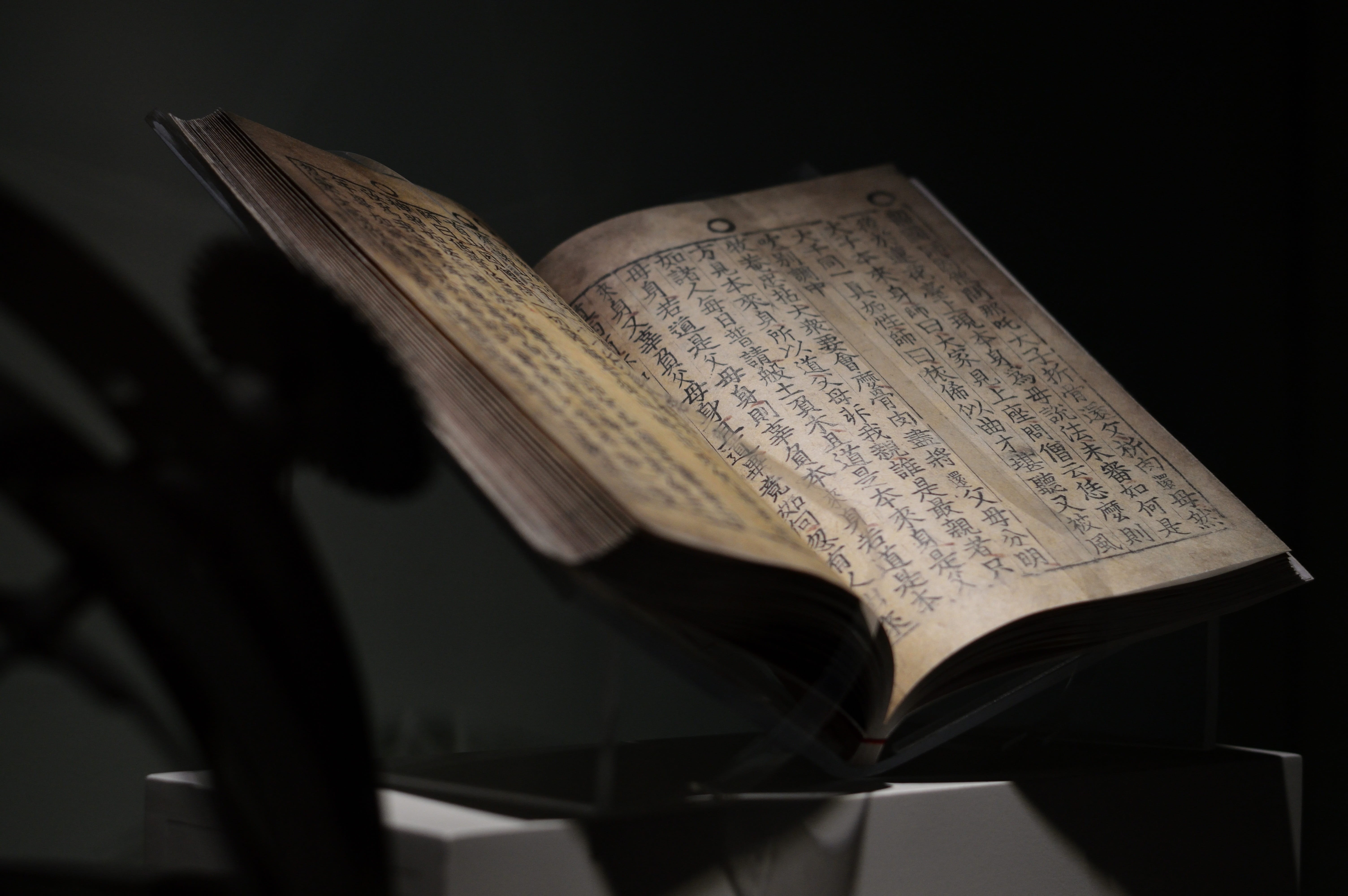 close-up, paper, indoors, old book, studio shot, spirituality, page, handmade, open, ink, aged, knowledge, old, black background, still life, chinese, religion, HD Wallpaper