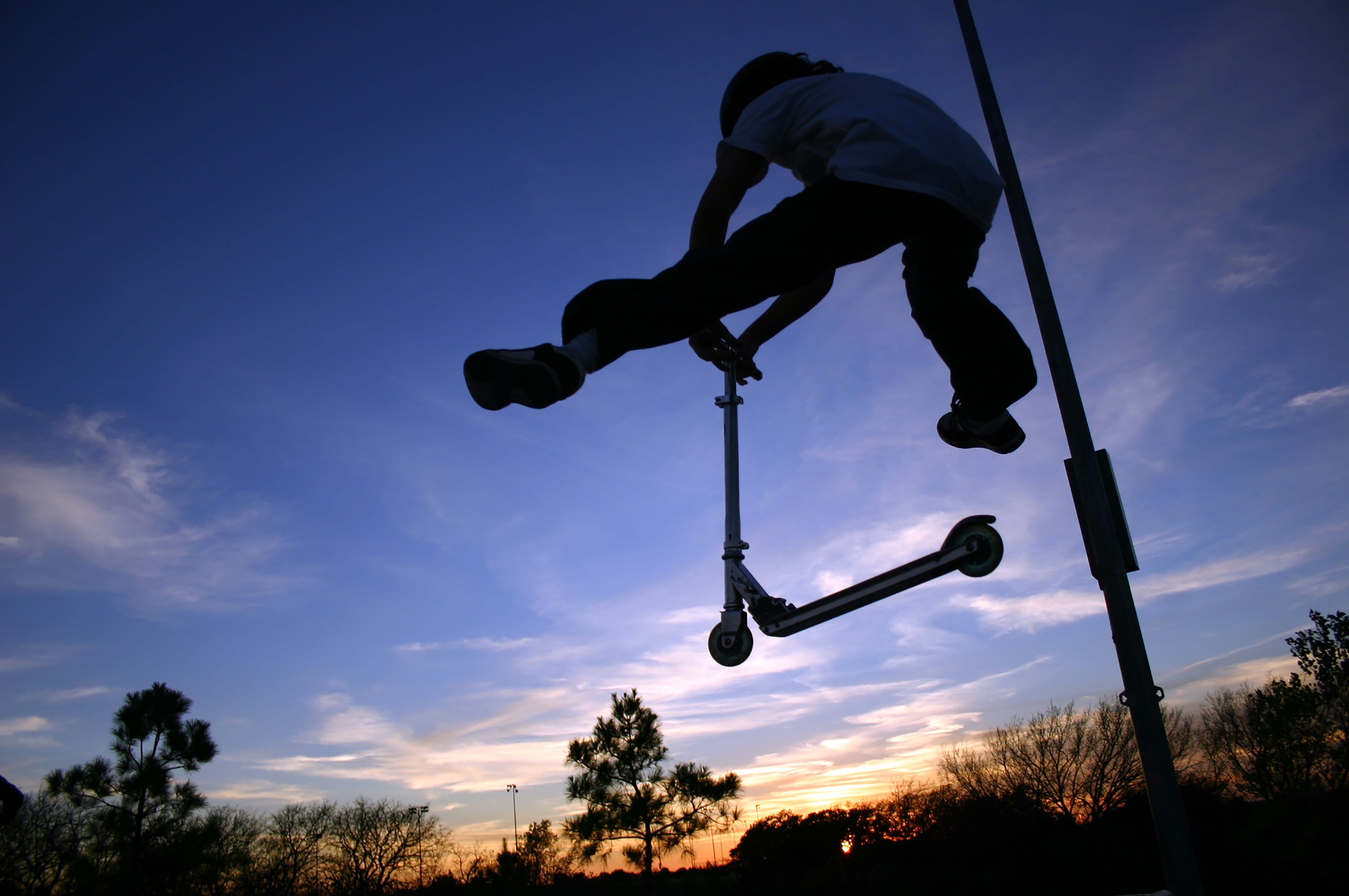 outdoors, mid-air, 2K, up, risk, adventure, elevate, sunset, jump, leisure activity, skatepark, sport, sky, scooter, one person, cloud - sky, flying, low angle view, HD Wallpaper