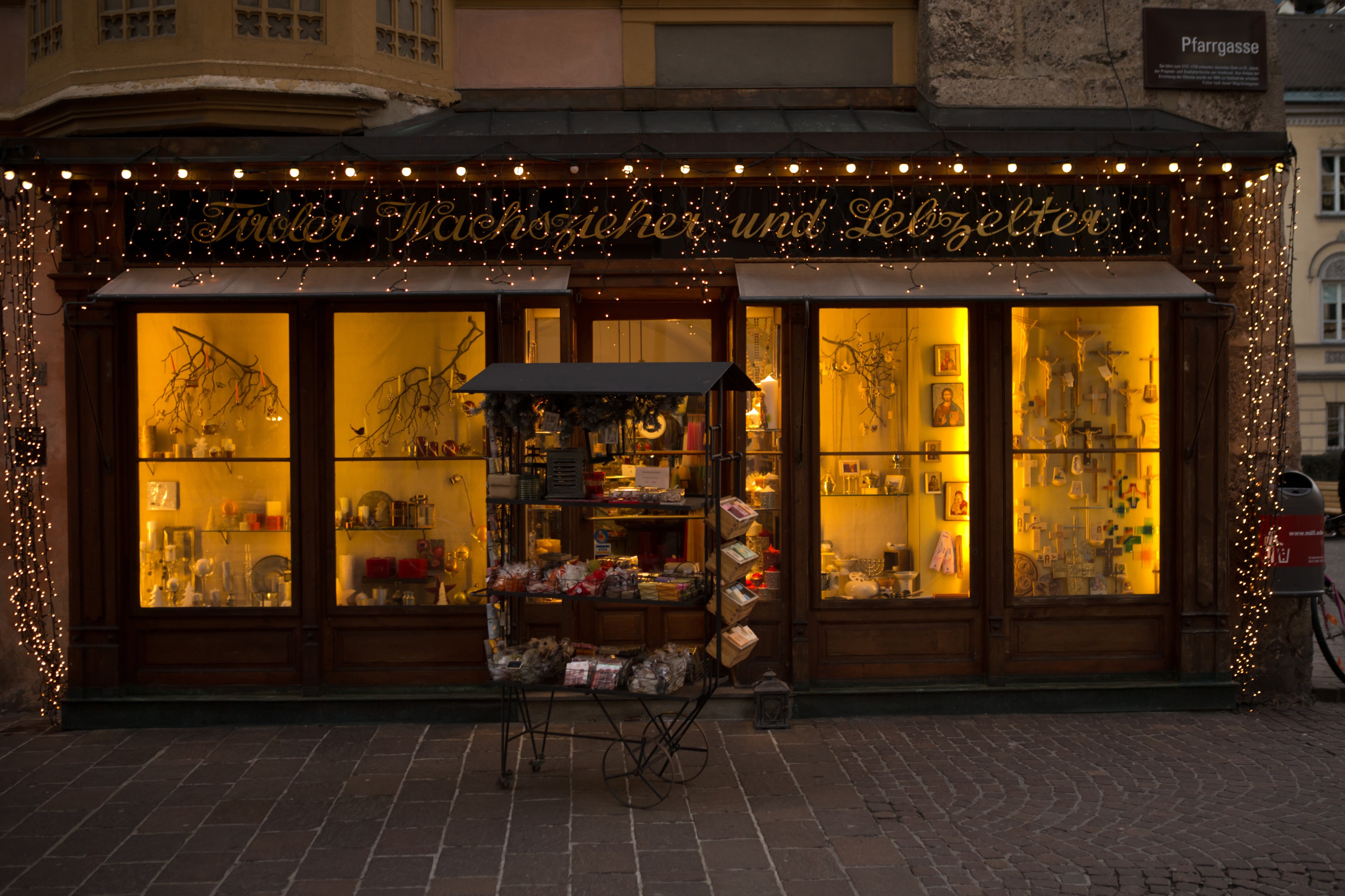display, 5K, food, front, outdoors, store, business, no people, candlemaker, retail, street, glass, innsbruck, building, christmas lights, shop window, HD Wallpaper