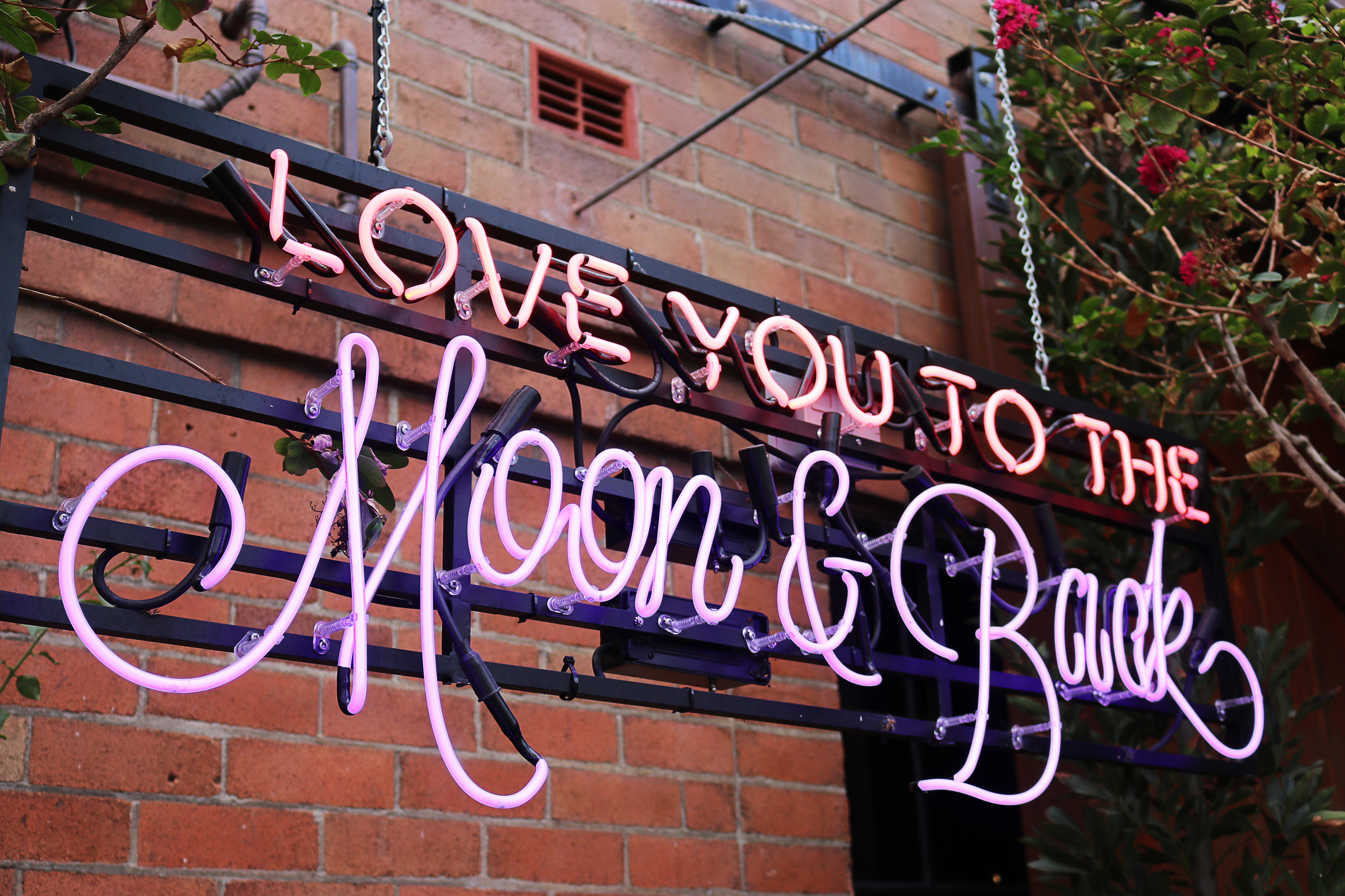day, text, metal, sign, information, building exterior, purple, love, message, light, no people, brick wall, signage, moon, brick, typography, pink, store sign, HD Wallpaper