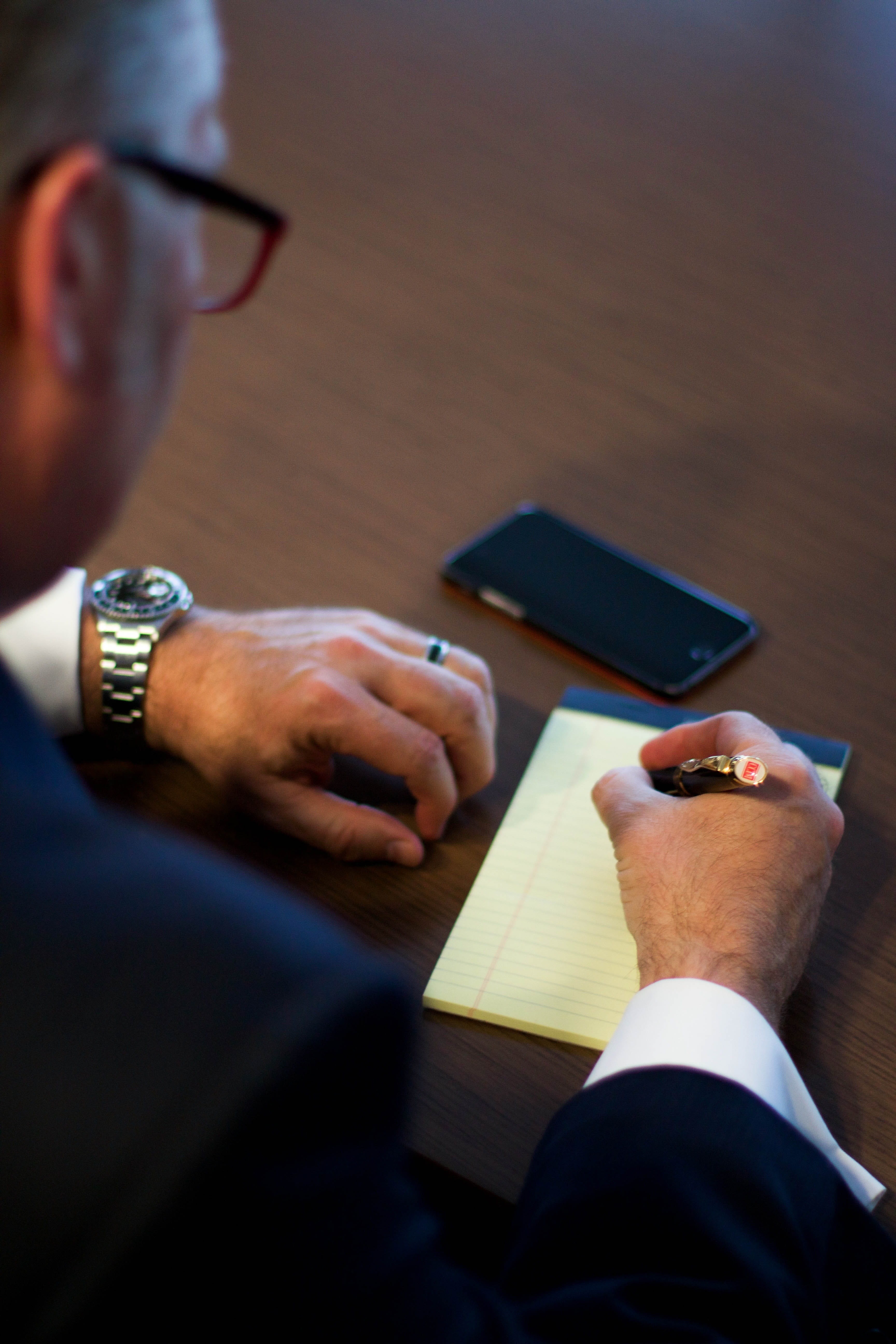 glasses, table, men, room, workplace, corporate, business person, smartphone, person, ruled, males, holding, mobile phone, real people, hand, wear, human hand, Phone HD Wallpaper