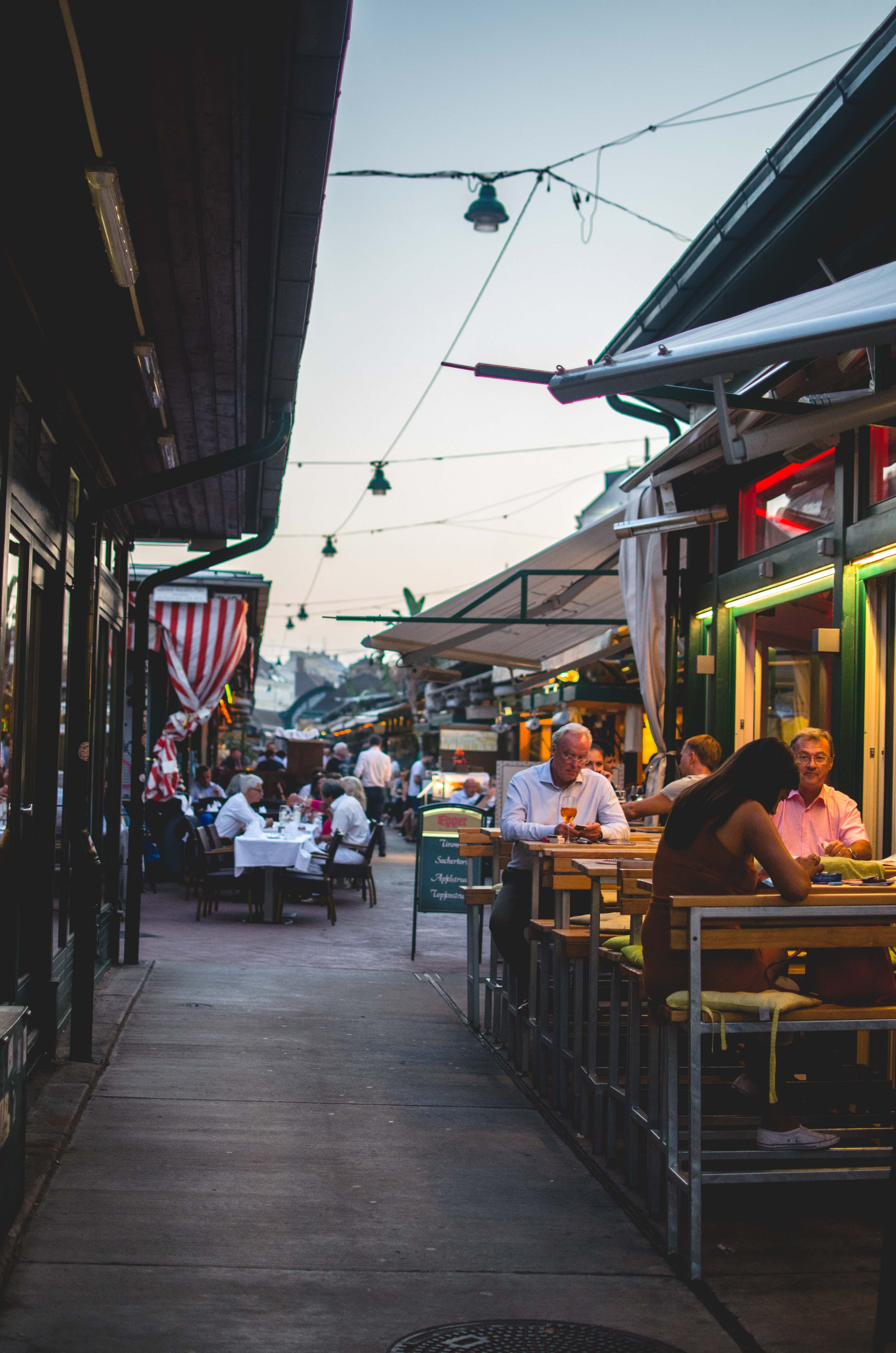 table, outdoors, crowd, seat, adult, meal, lifestyles, human, cafe, 4K, real people, built structure, restaurant, building exterior, food, market, street, Phone HD Wallpaper