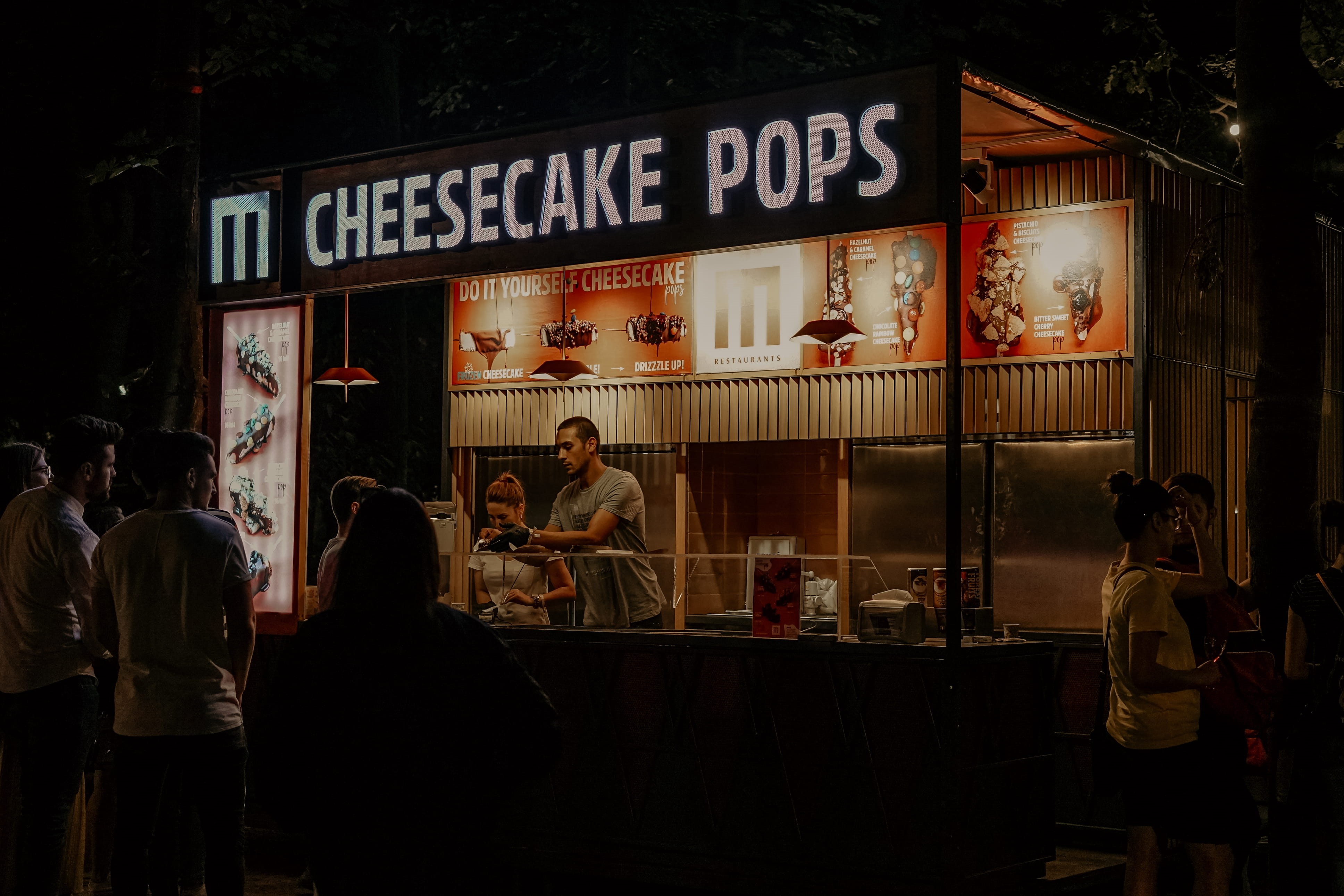 group of people, architecture, food and drink, men, restaurant, stall, text, shop, pub, person, furniture, night, shelf, illuminated, sign, kiosk, cafeteria, HD Wallpaper