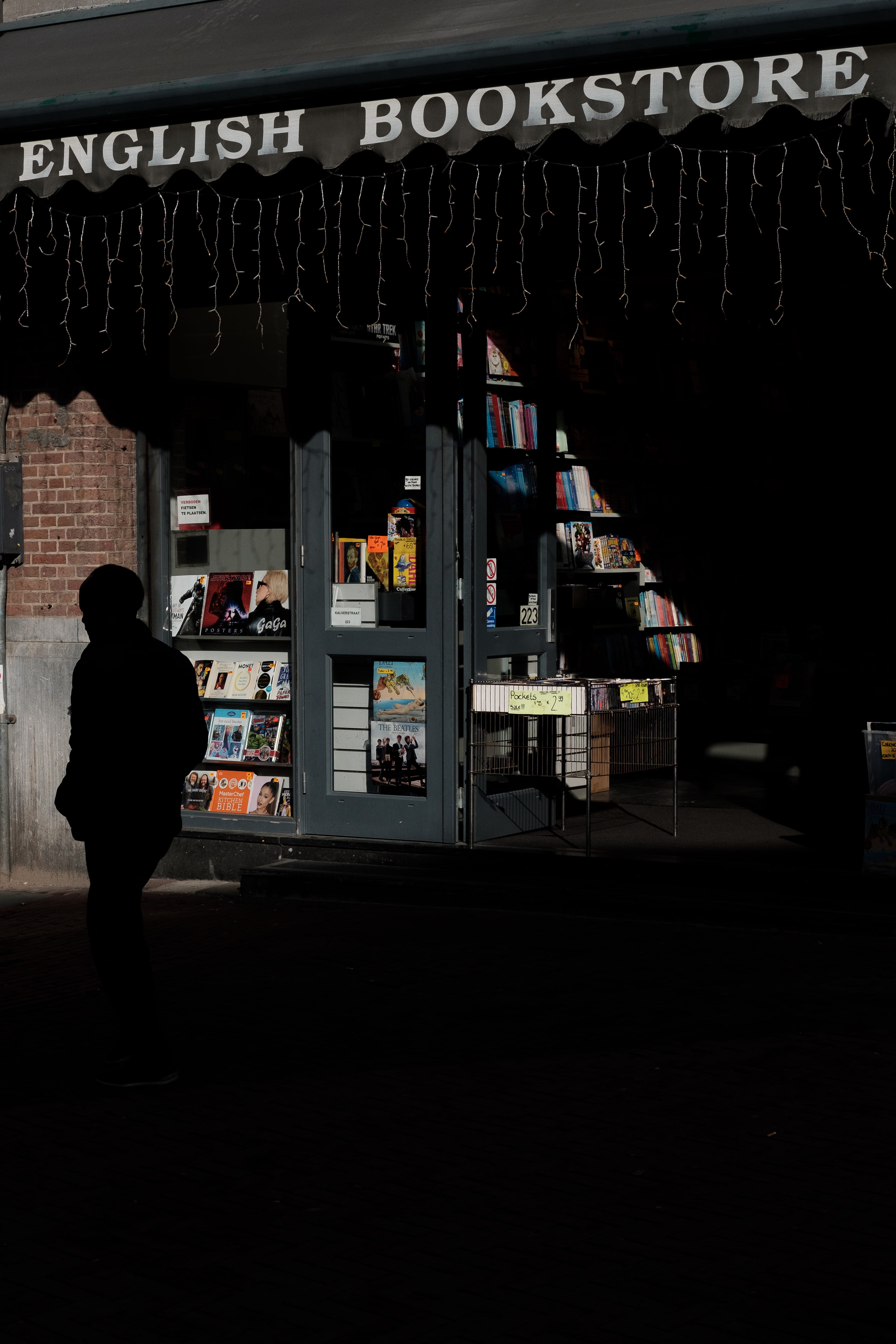shop, signage, newsstand, person, built structure, real people, curtain, 5K, kiosk, architecture, bookstore, lifestyles, large group of objects, pub, standing, Phone HD Wallpaper