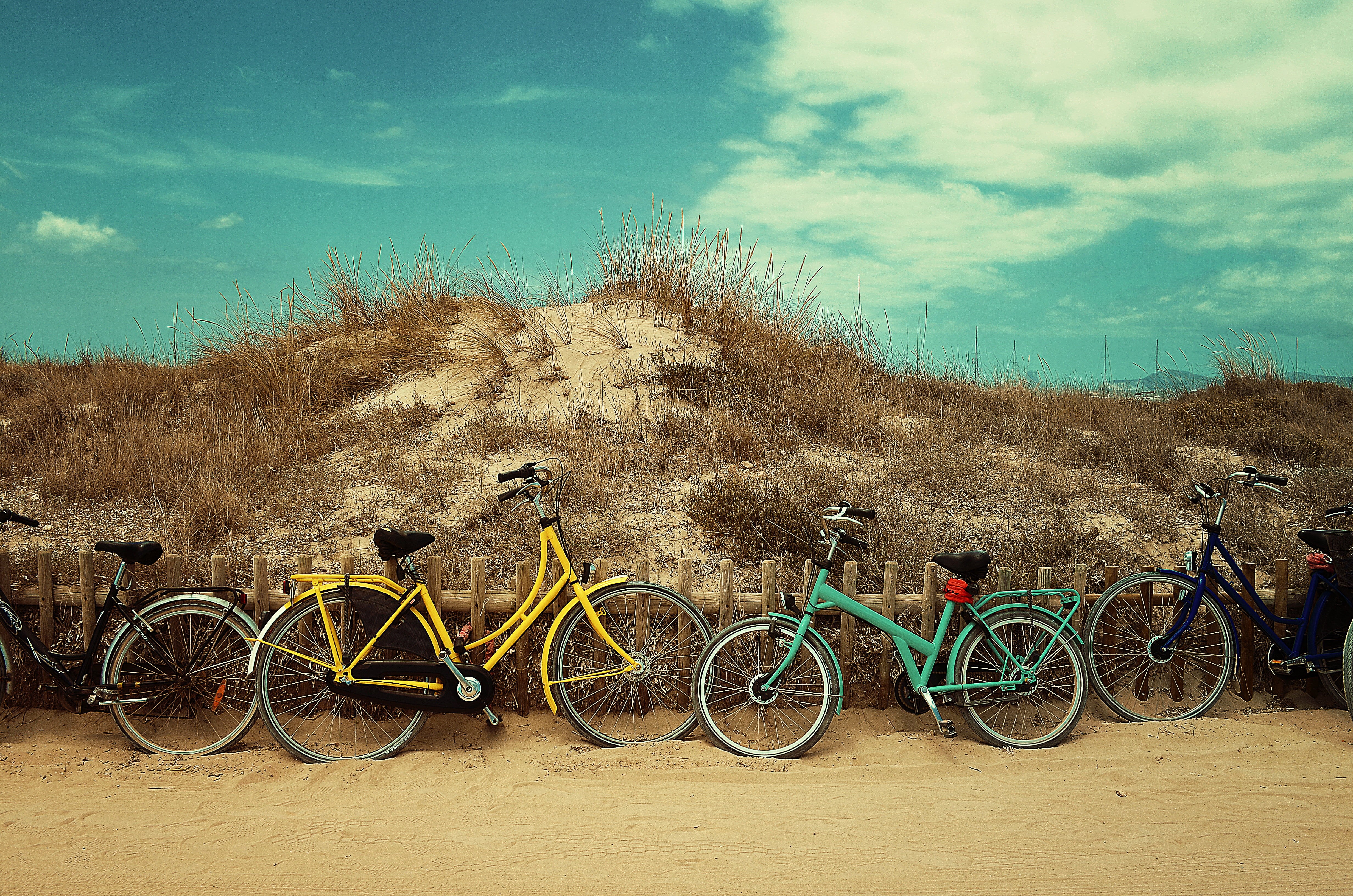 wooden, assorted, mode of transportation, nature, near, cloud - sky, four, tree, land vehicle, land, hobby, bikes, 4K, fence, parking, beside, clouds, HD Wallpaper