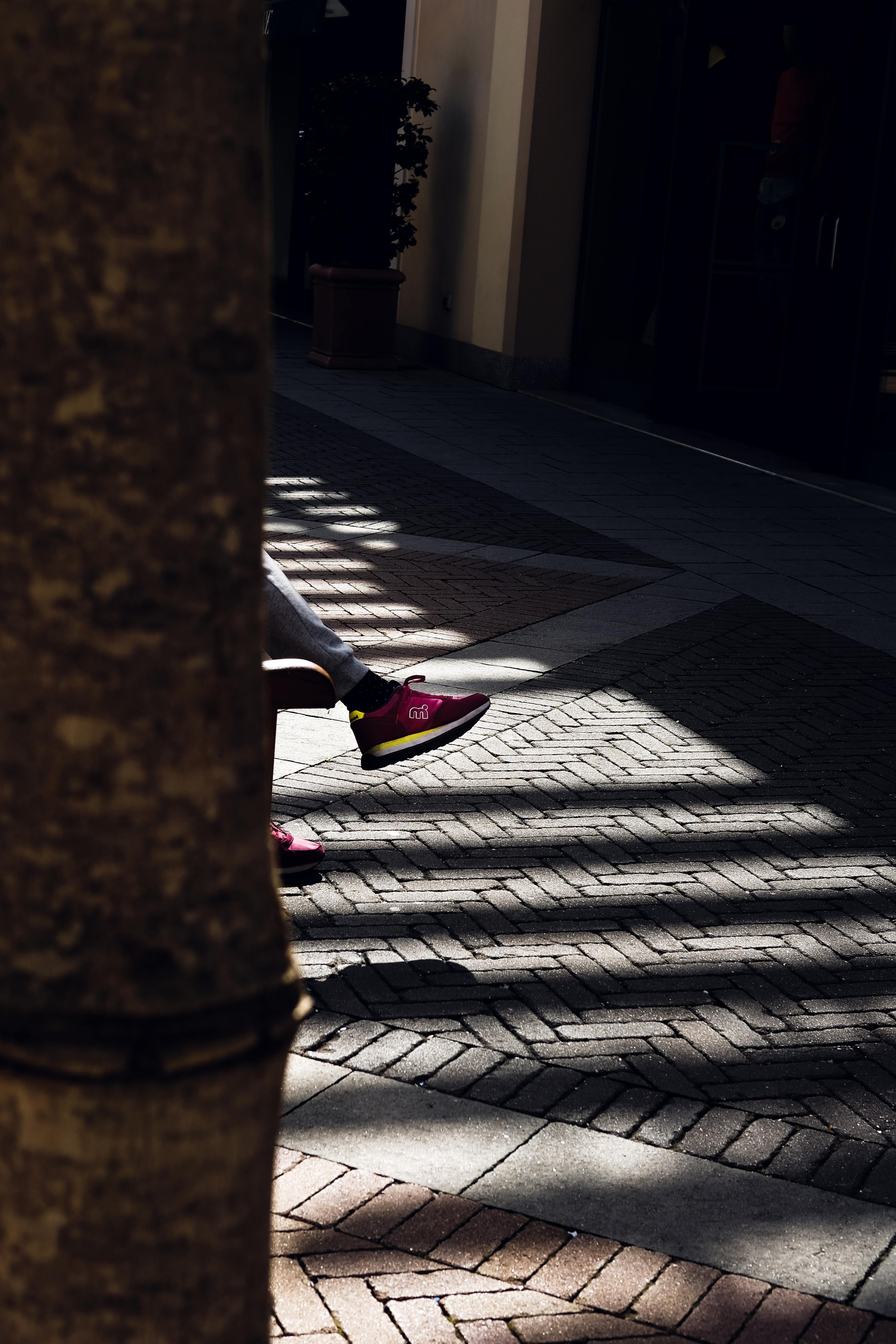 street photography, asphalt, focus on shadow, building exterior, entrance, cobblestone, shadow, path, sitting, pedestrian, footpath, real people, infront, Phone HD Wallpaper