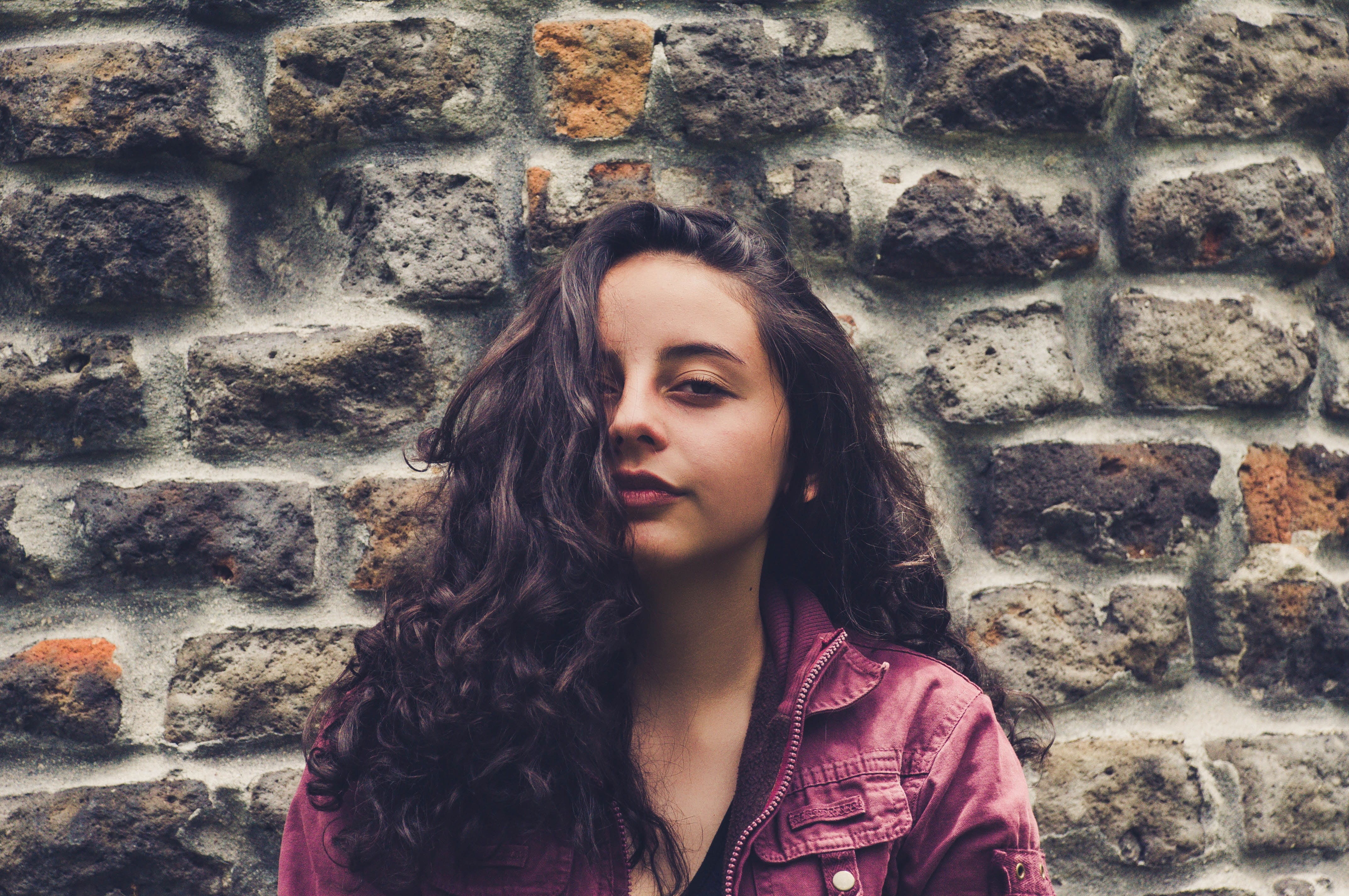 front view, hairstyle, happy, open air, adult, beautiful, wall, casual Clothing, wall - Building Feature, one Woman Only, females, jacket, birds, wings, HD Wallpaper