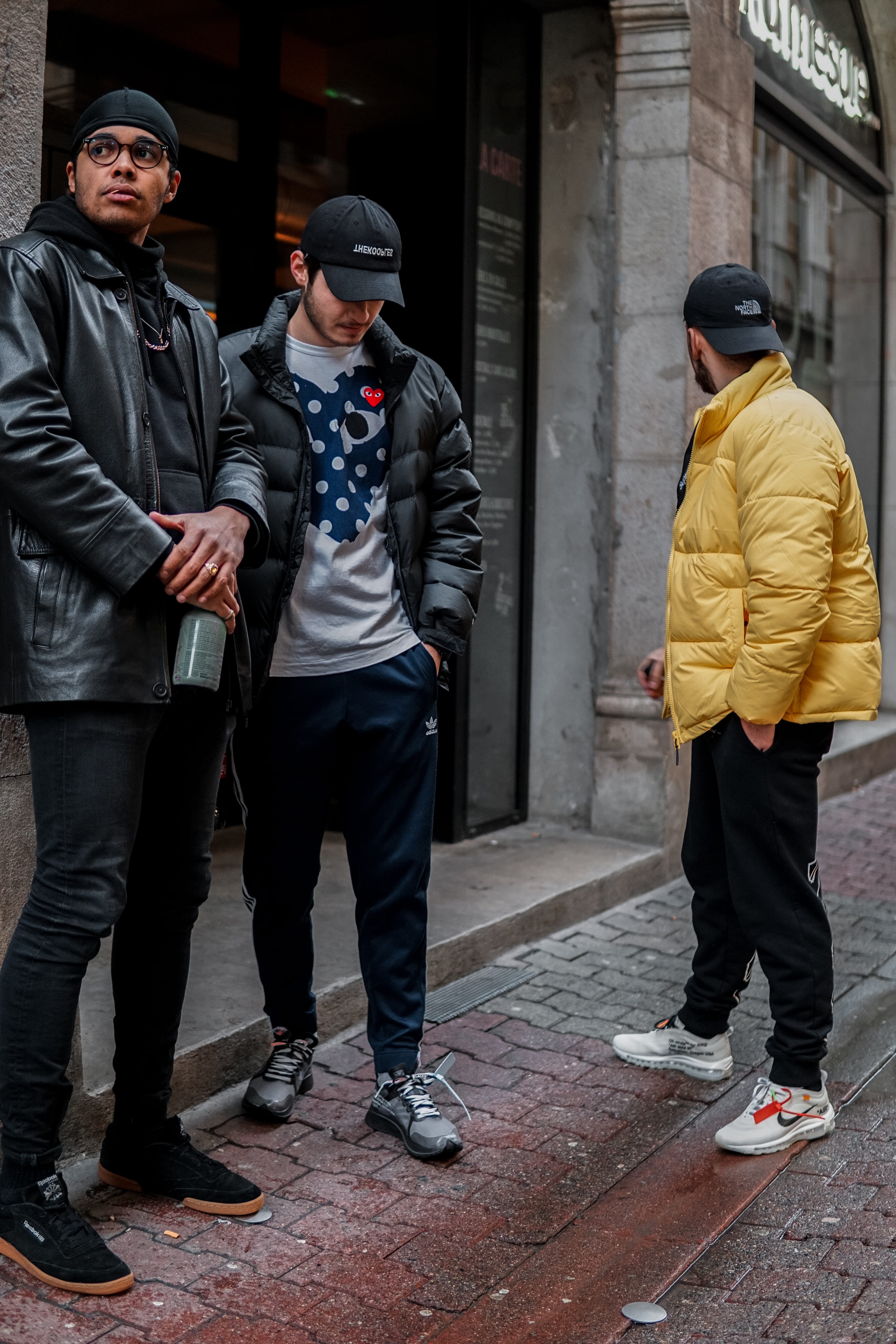 built structure, day, man, cap, boot, three, running shoe, standing, building, grenoble, hat, full length, beanie, lifestyles, clothing, people, 5K, long sleeve, Phone HD Wallpaper