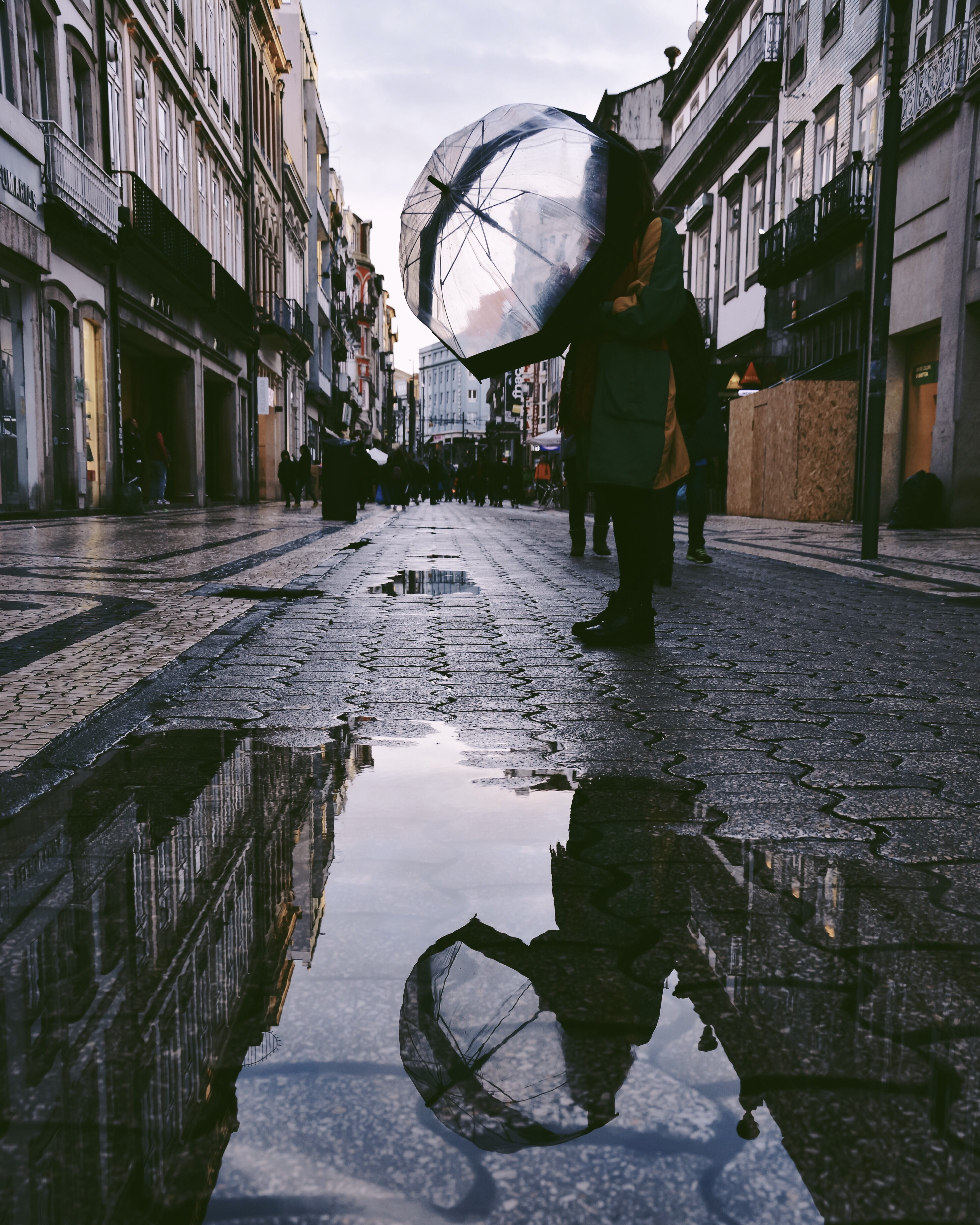 overcoat, town, one person, built structure, clothing, outdoors, person, path, reflection model rainy day puddle umbrella street life people darksky travel photography vintage retro colorful raincoat cold, Phone HD Wallpaper