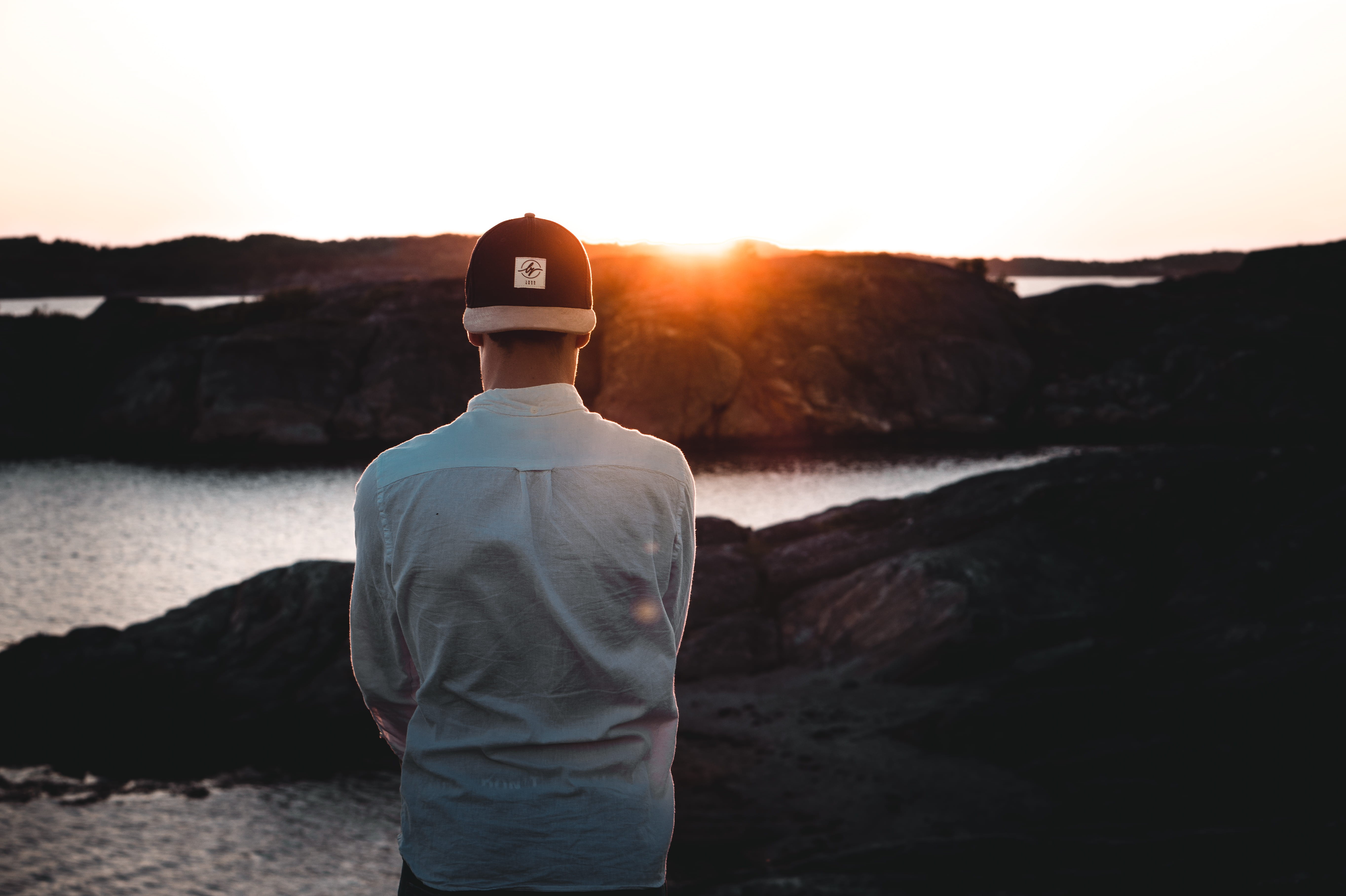 land, casual clothing, 5K, tranquility, hour, adult, shirt, dusk, person, looking away, white, orange, one person, beauty in nature, sunset, sky, outdoors, HD Wallpaper