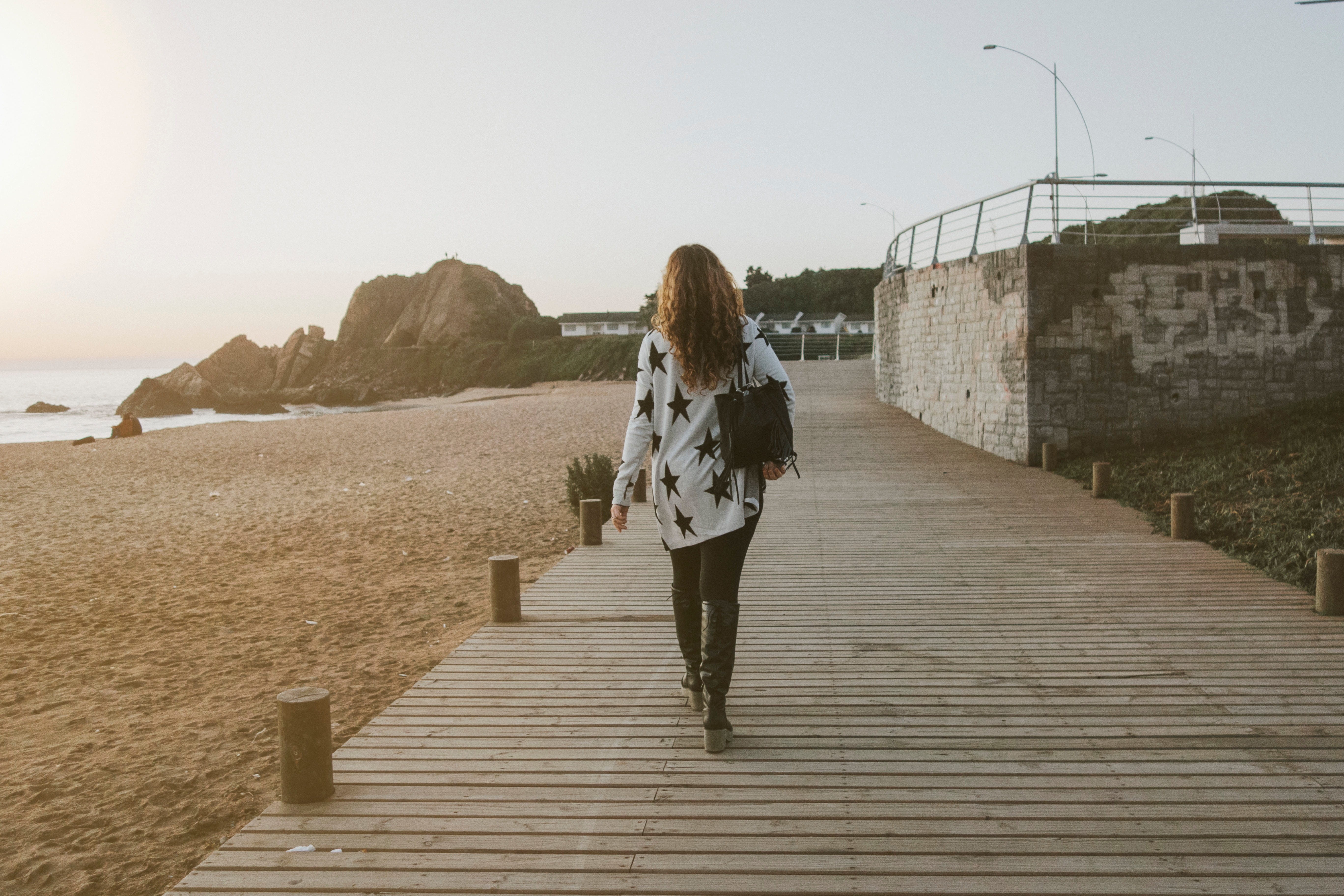 beach, lifestyles, pathway, sky, day, woman in white, hairstyle, walking on, brown, jeans, one Person, females, caucasian Ethnicity, full length, water, HD Wallpaper