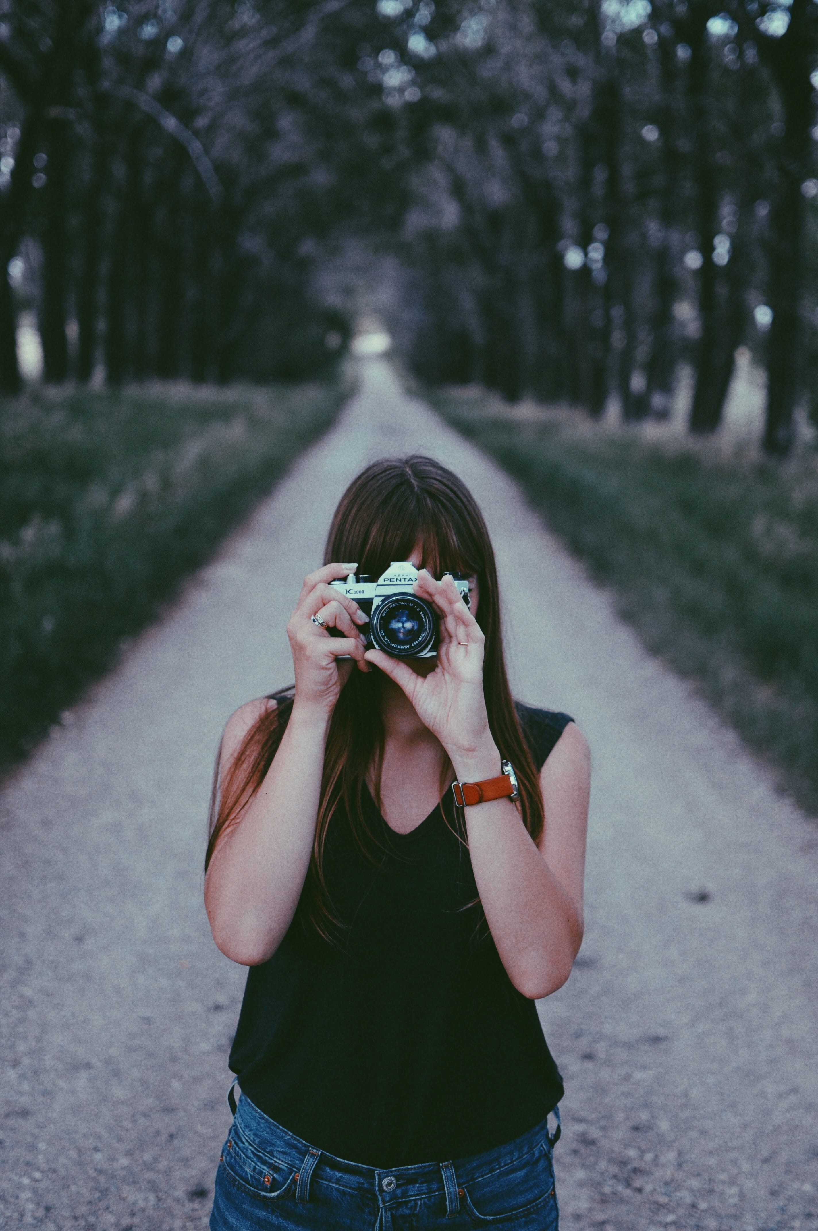 sleeveless, activity, camera - Photographic Equipment, adult, black, top, bridge, path, gray, nature, focus on foreground, pink, tree, blue, holding, grey, Phone HD Wallpaper
