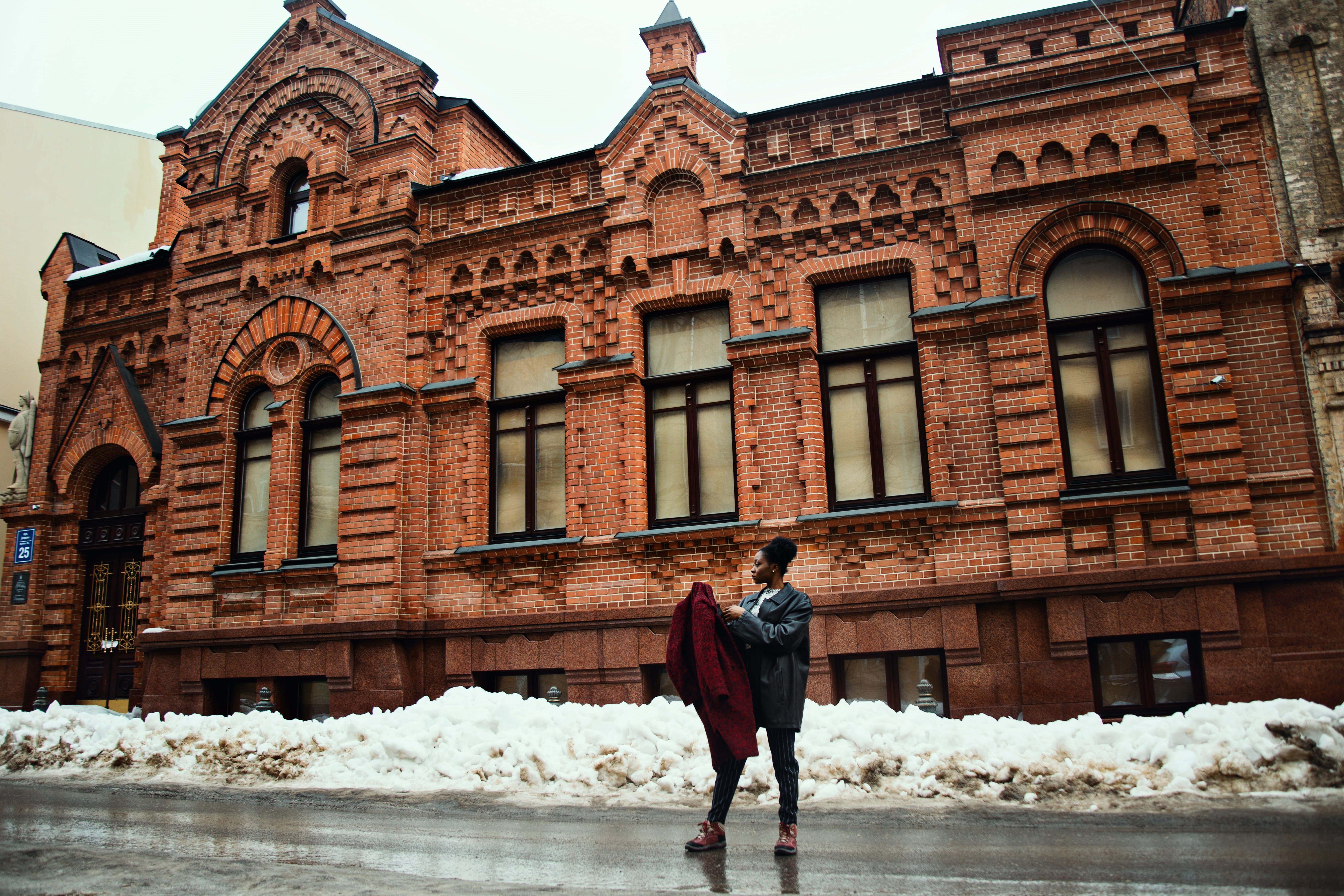 person, cold temperature, brown, snow, daytime, near, leisure activity, warm clothing, building, outdoors, lifestyles, real people, 5K, winter, windows, HD Wallpaper