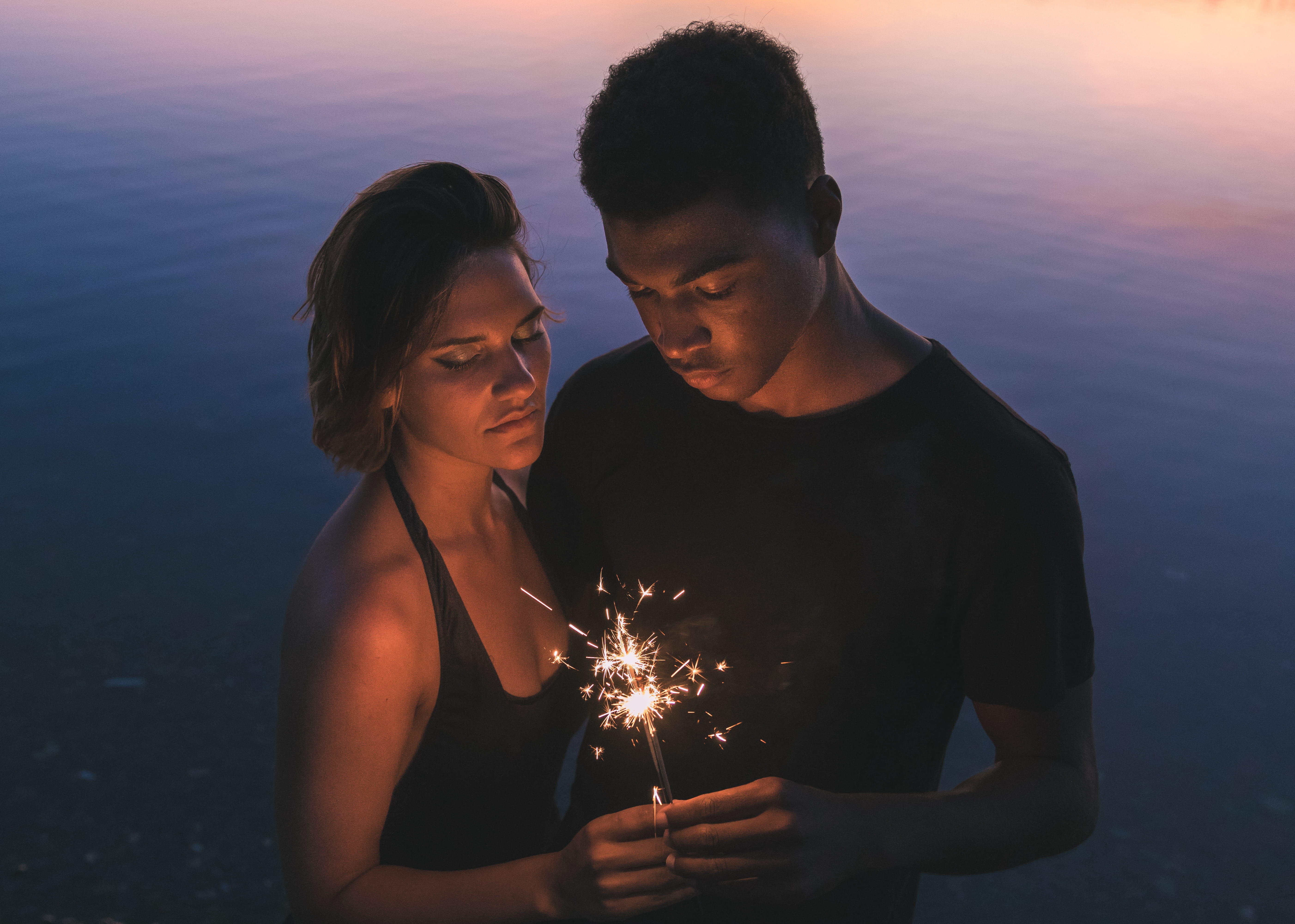 woman, cheerful, summer, enjoyment, front view, wtaer, dating, firework, women, young Men, outdoors, holding, real people, sunset, sparkler, young Adult, HD Wallpaper