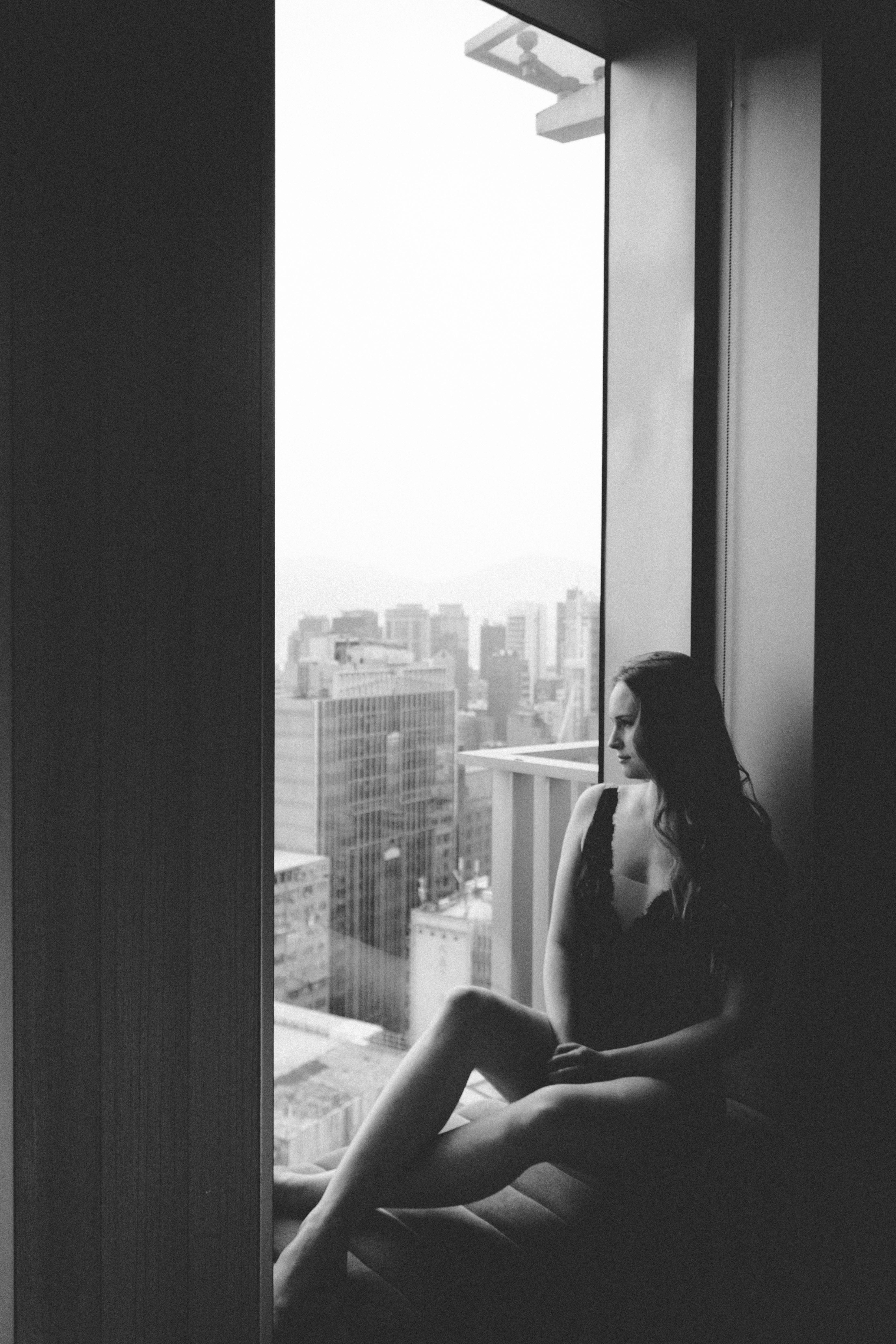 relaxation, contemplation, black and white, cityscape, indoors, skyscraper, female, window light, mirror, day, wearing, woman, window ledge, glass - material, Phone HD Wallpaper