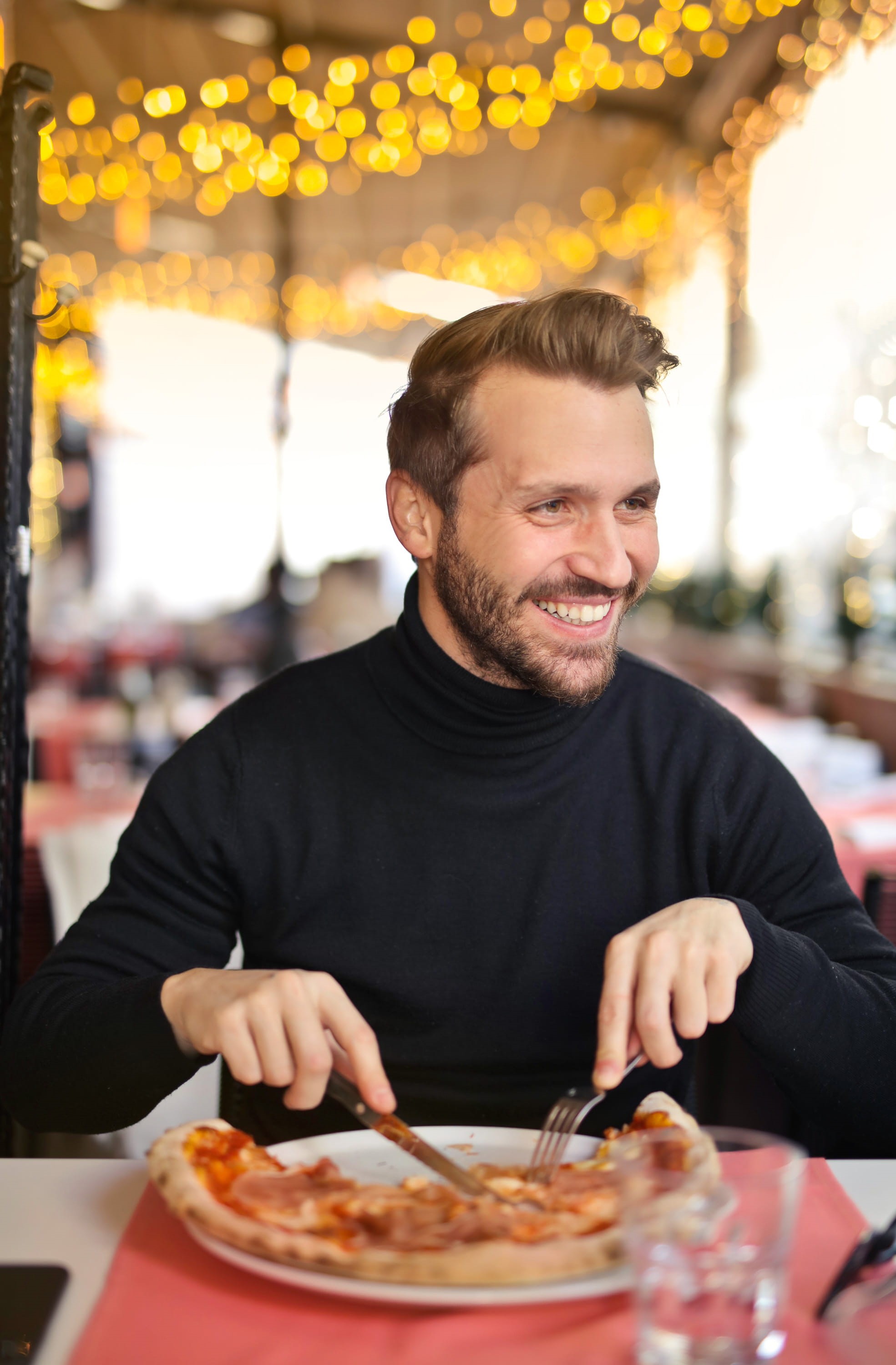 facial hair, business, males, turtleneck sweater, tomato, white, one person, young adult man, Restaurant, black sweater, fork, casual clothing, table, Sitting, Phone HD Wallpaper